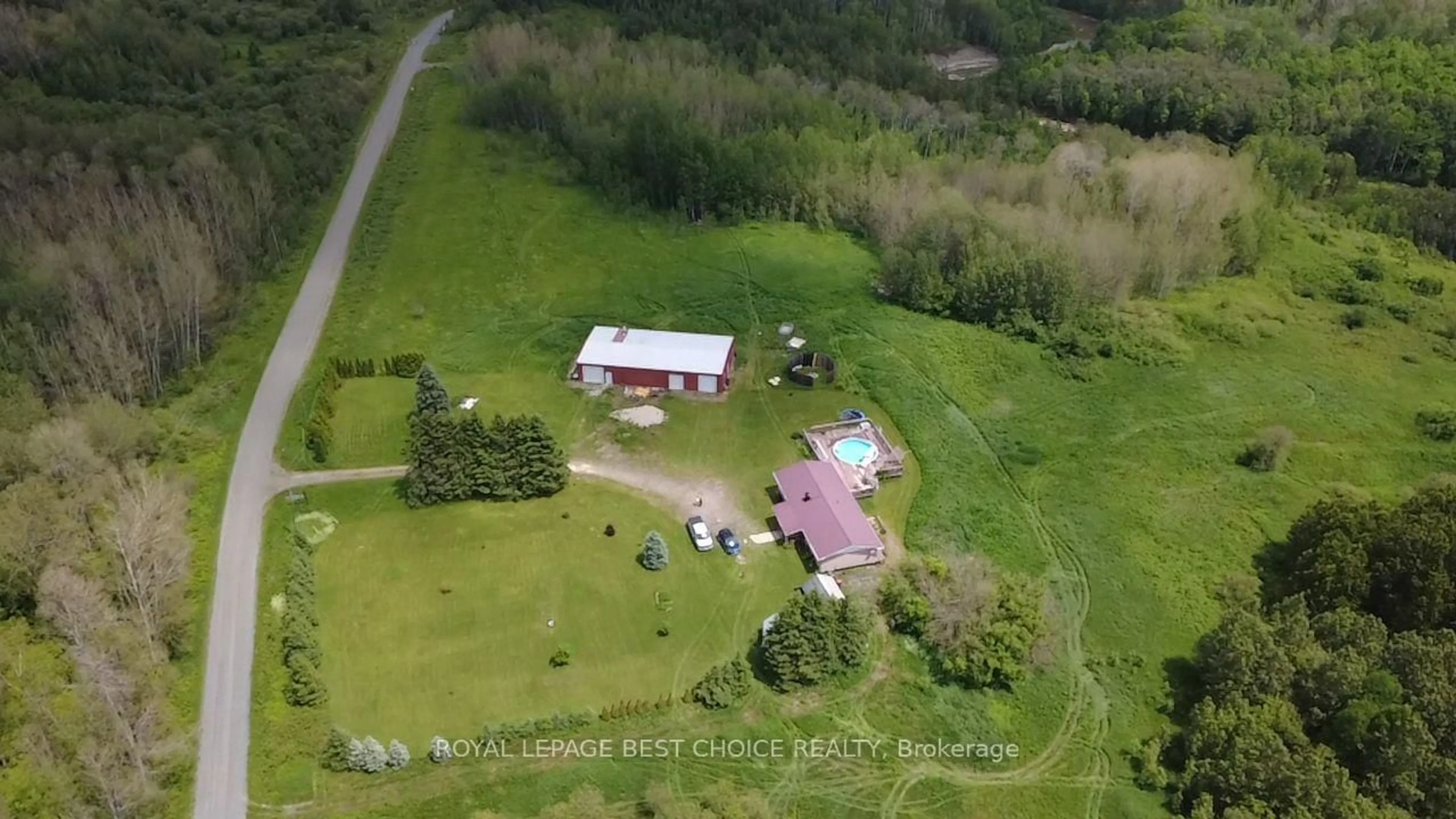A pic from outside/outdoor area/front of a property/back of a property/a pic from drone, building for 246288 Harman's Rd, Englehart Ontario P0J 1H0