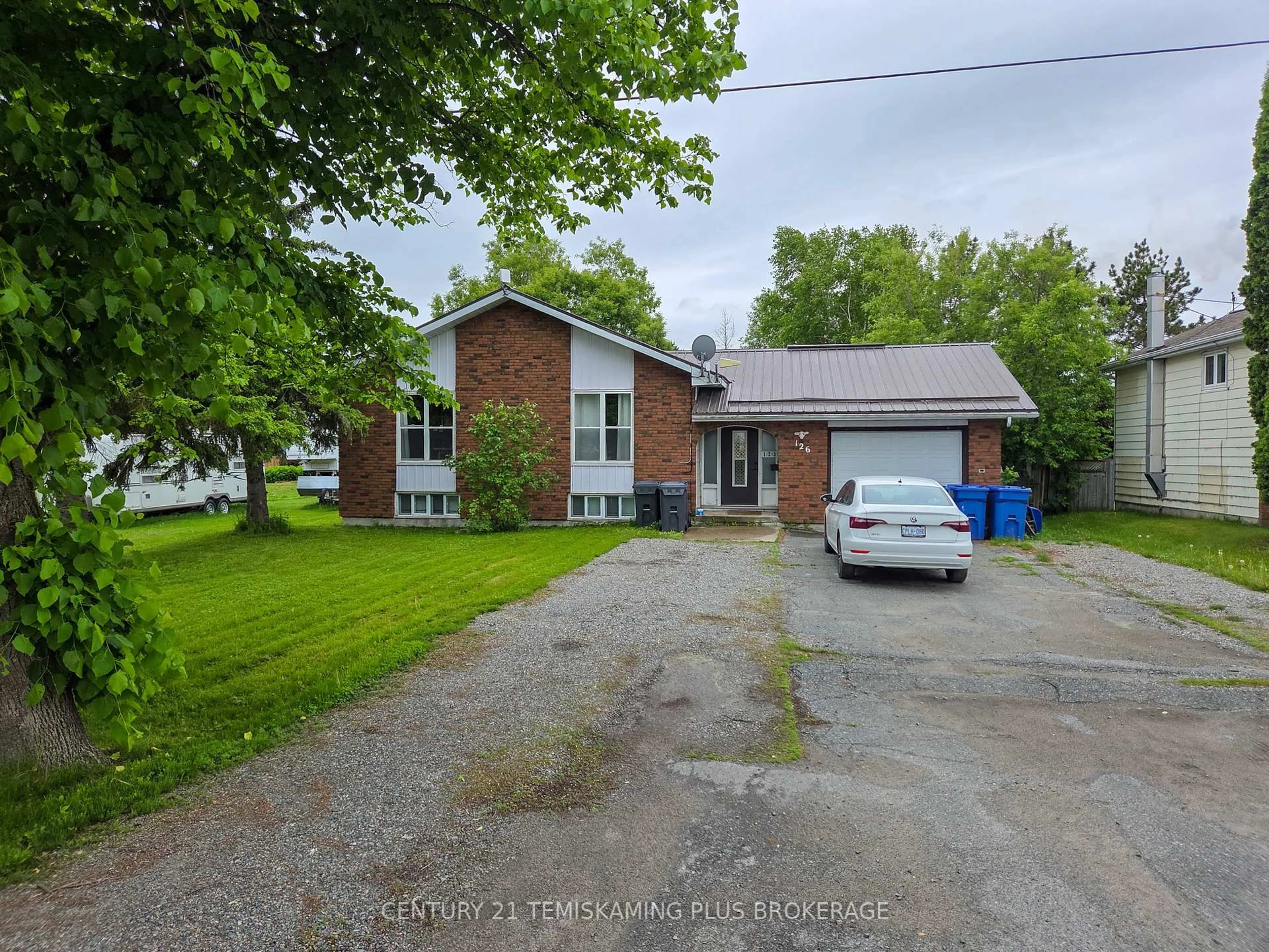 A pic from outside/outdoor area/front of a property/back of a property/a pic from drone, street for 126 Fourth Ave, Englehart Ontario P0J 1H0
