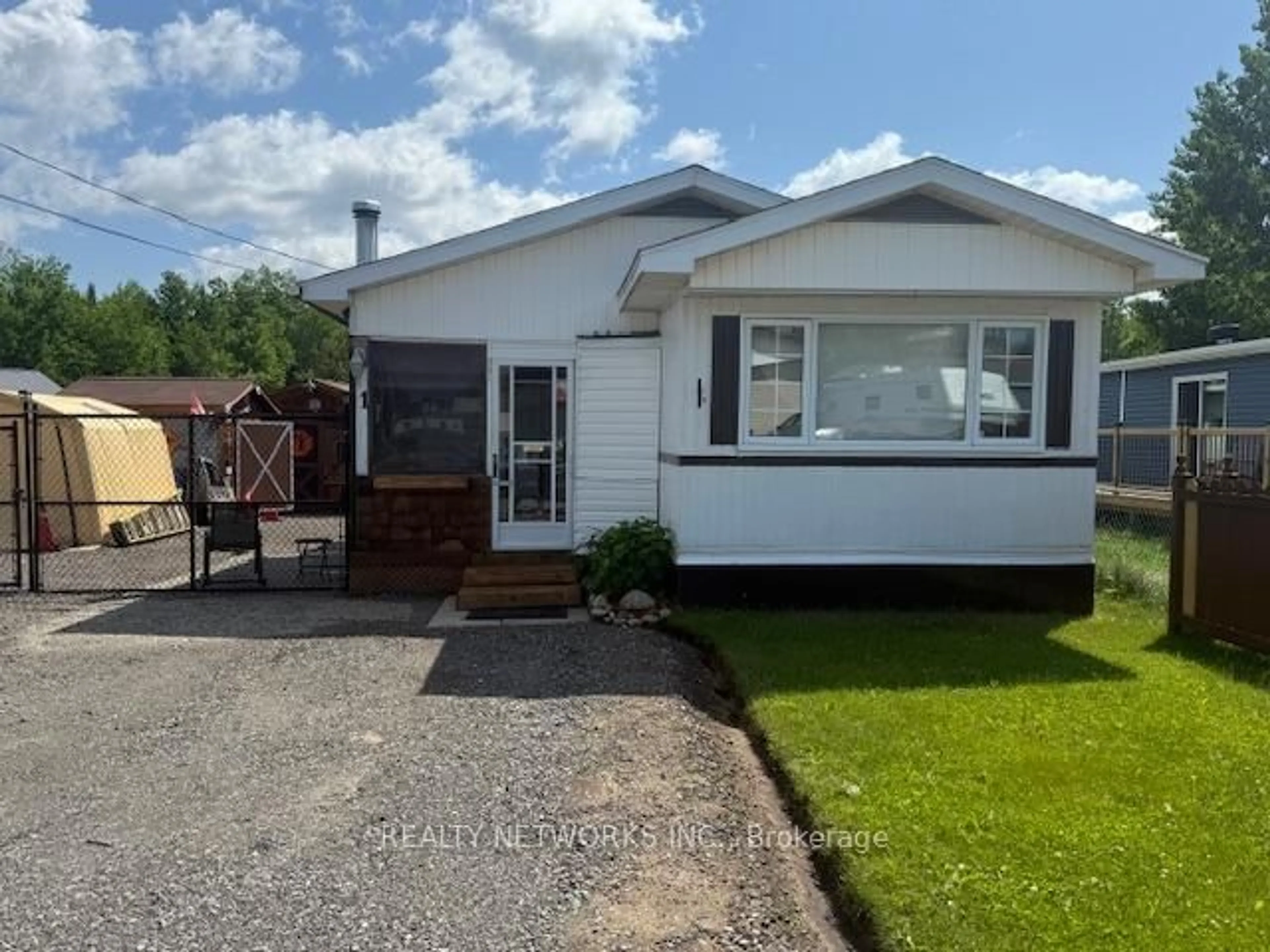 Home with vinyl exterior material, street for 1 Moose Rd, Timmins Ontario P4R 0E5