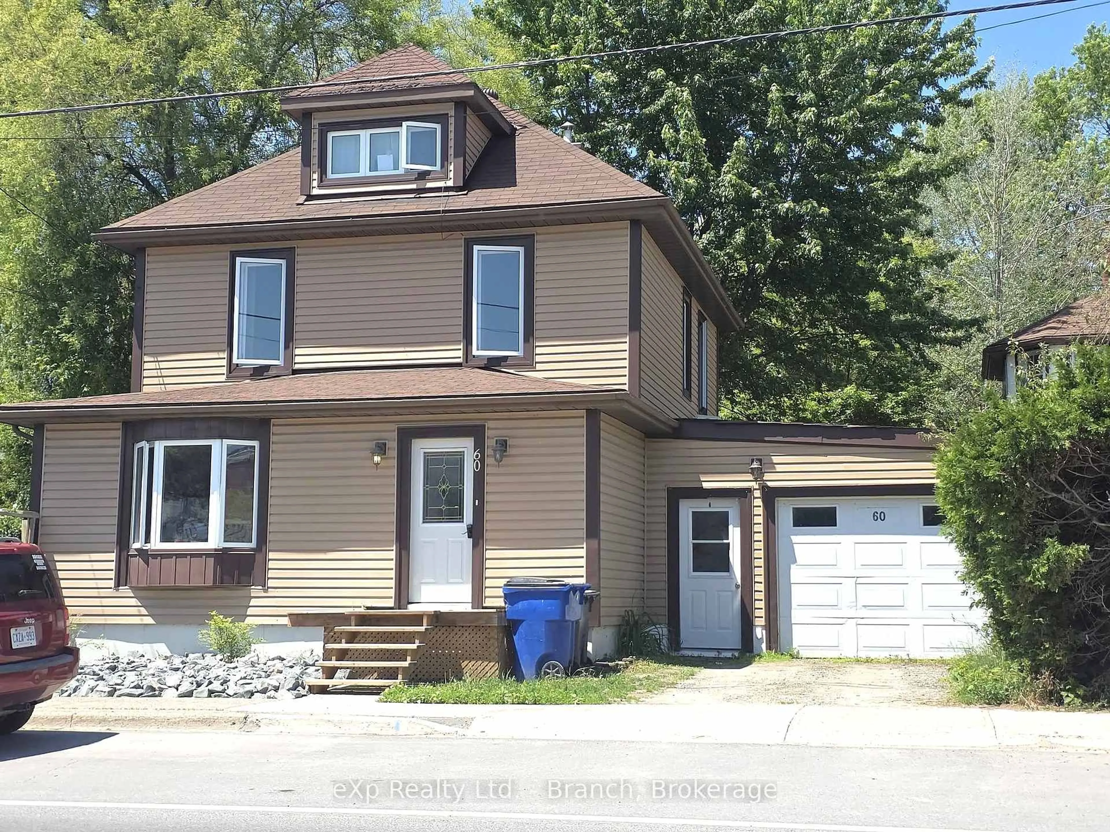 Home with vinyl exterior material, street for 60 Lakeshore Rd, Temiskaming Shores Ontario P0J 1P0