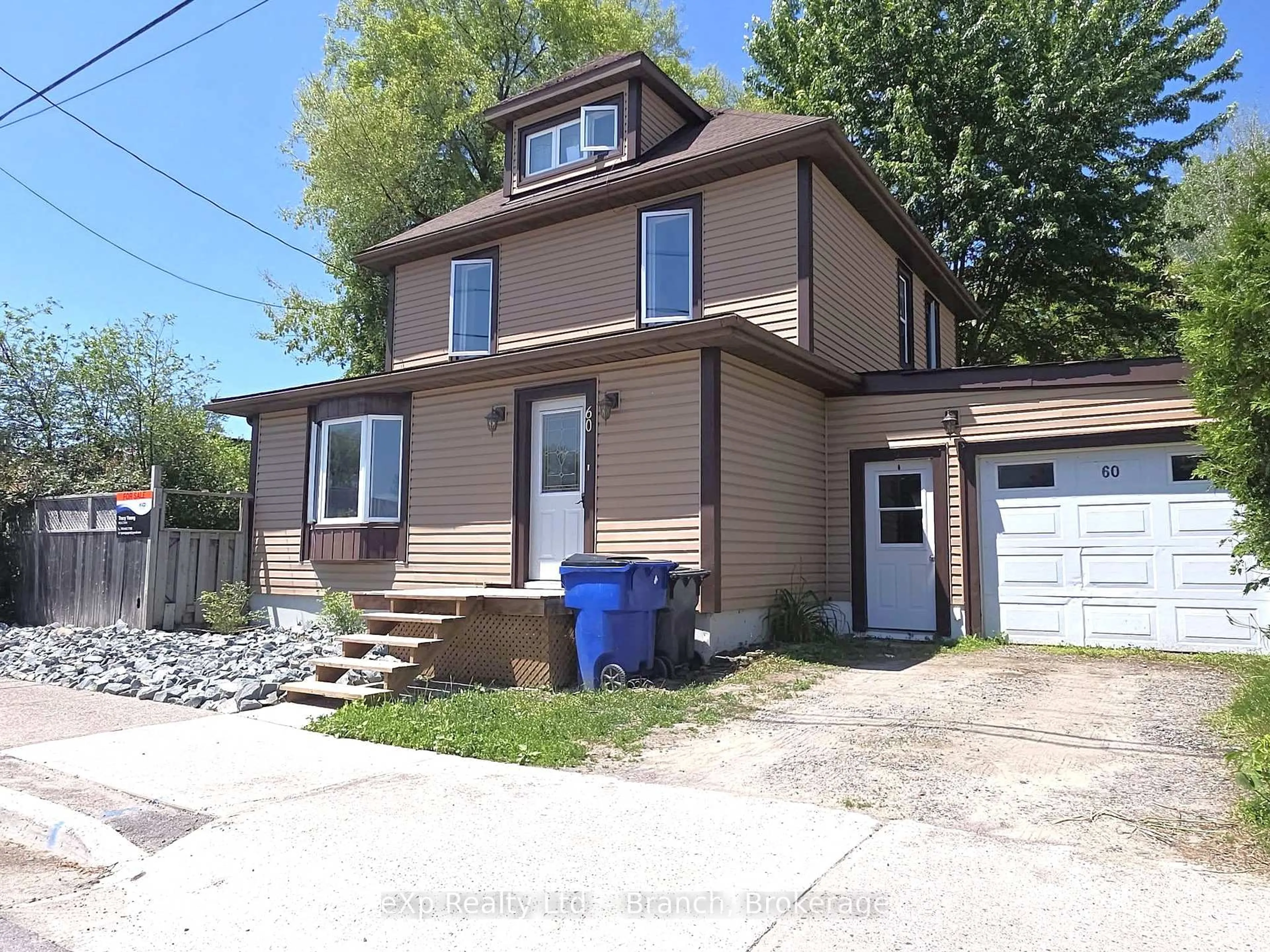 Home with vinyl exterior material, street for 60 Lakeshore Rd, Temiskaming Shores Ontario P0J 1P0