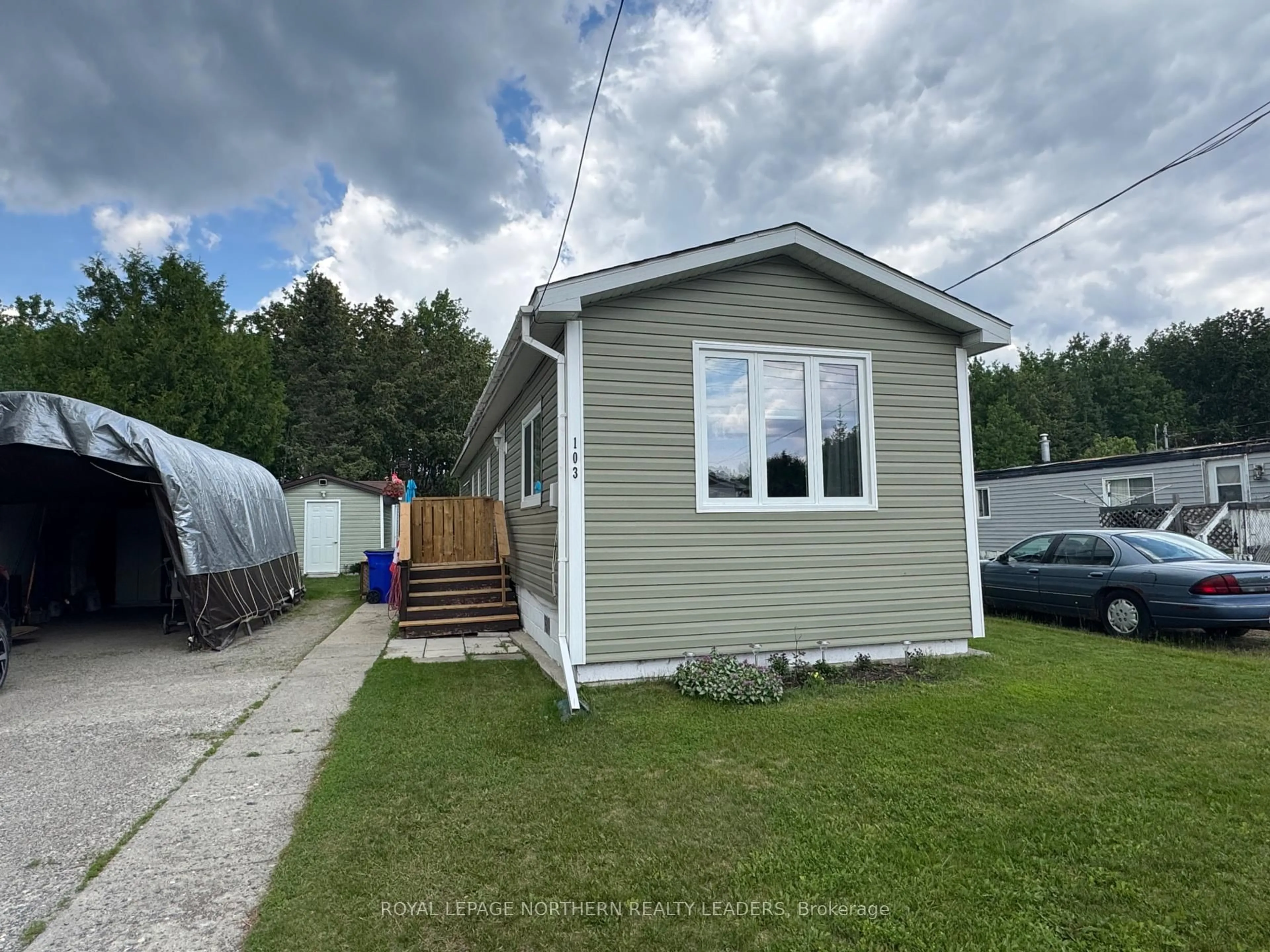 Home with vinyl exterior material, street for 103 Notre Dame Pl, Timmins Ontario P4N 5L9