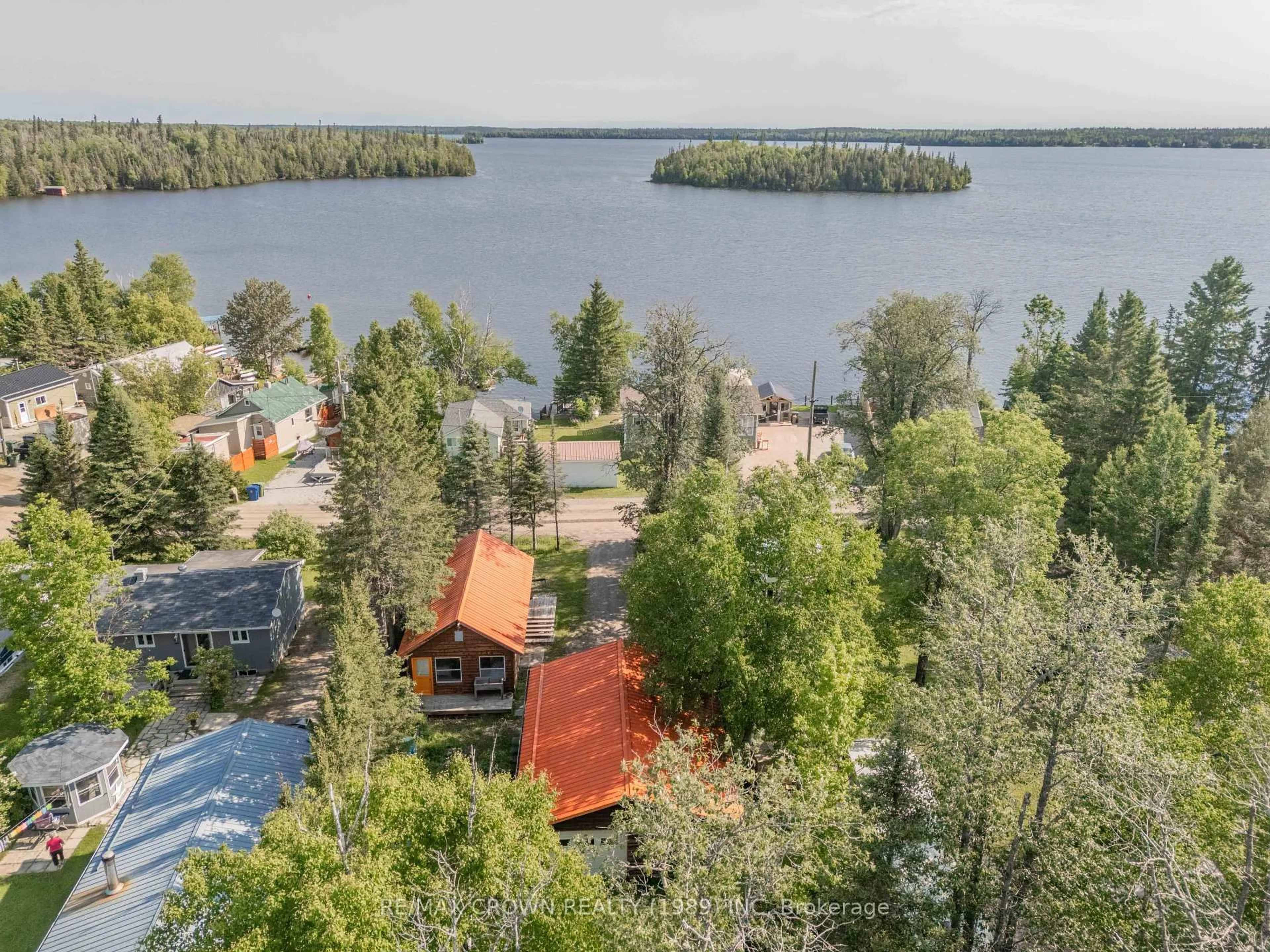 A pic from outside/outdoor area/front of a property/back of a property/a pic from drone, water/lake/river/ocean view for 158 Lefebvre Peninsula Rd, Moonbeam Ontario P0L 1V0