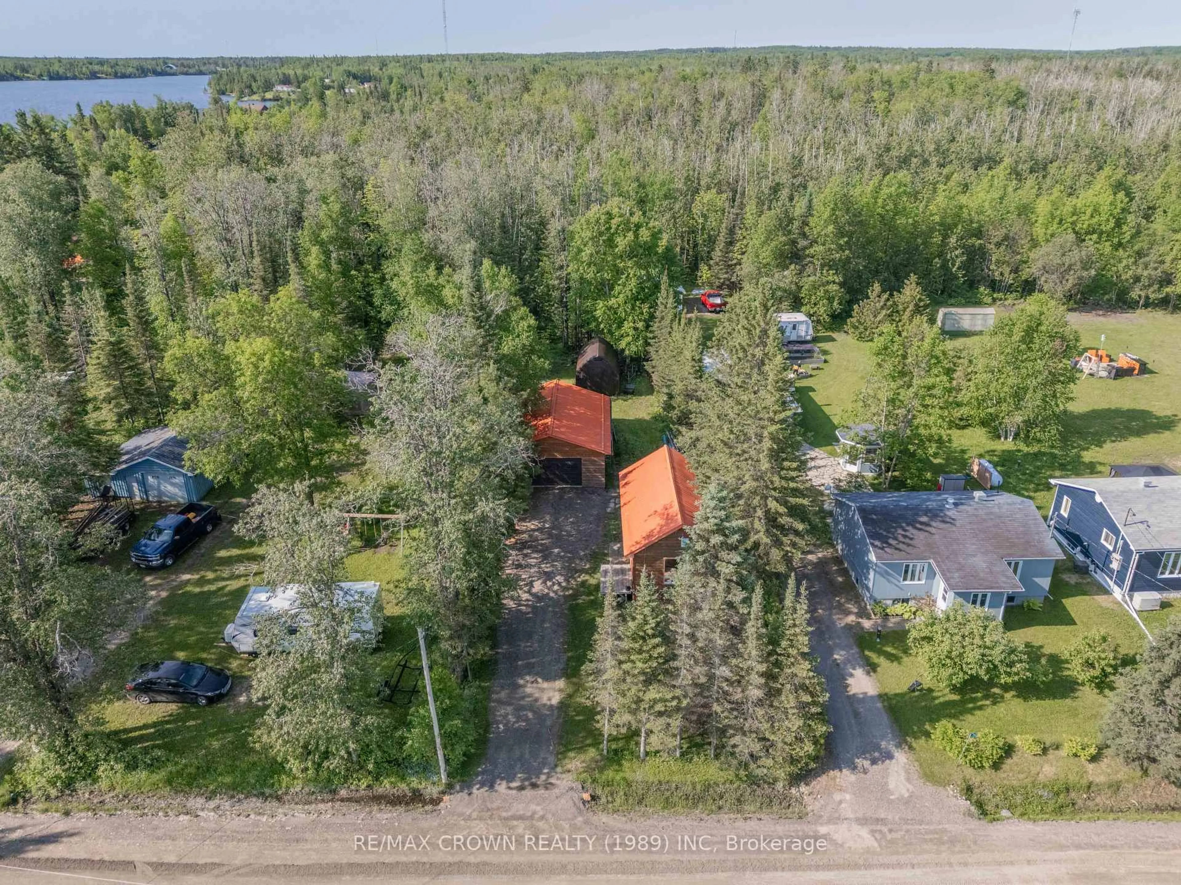 A pic from outside/outdoor area/front of a property/back of a property/a pic from drone, water/lake/river/ocean view for 158 Lefebvre Peninsula Rd, Moonbeam Ontario P0L 1V0