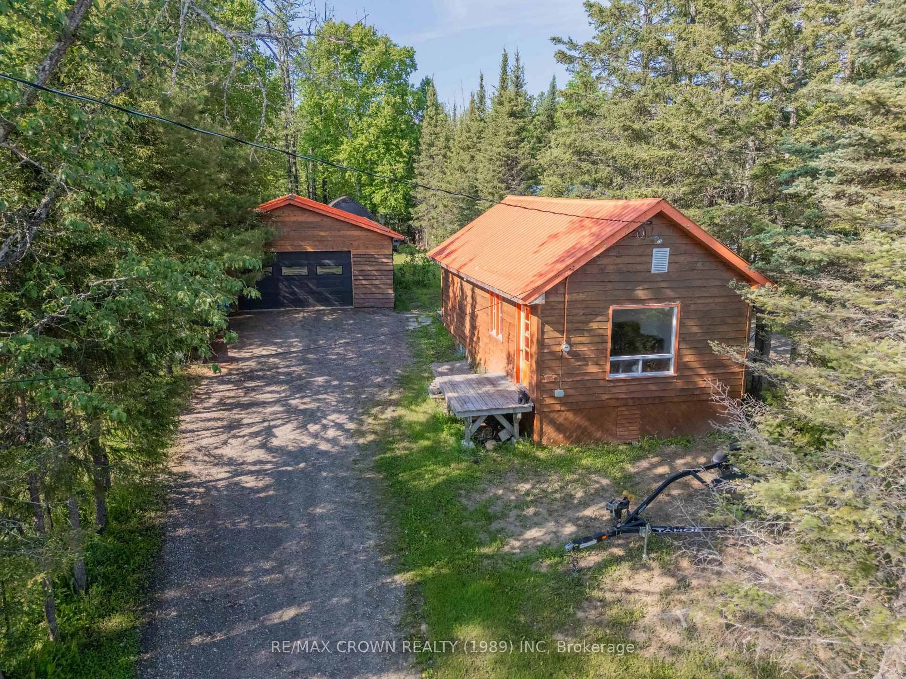 A pic from outside/outdoor area/front of a property/back of a property/a pic from drone, forest/trees view for 158 Lefebvre Peninsula Rd, Moonbeam Ontario P0L 1V0