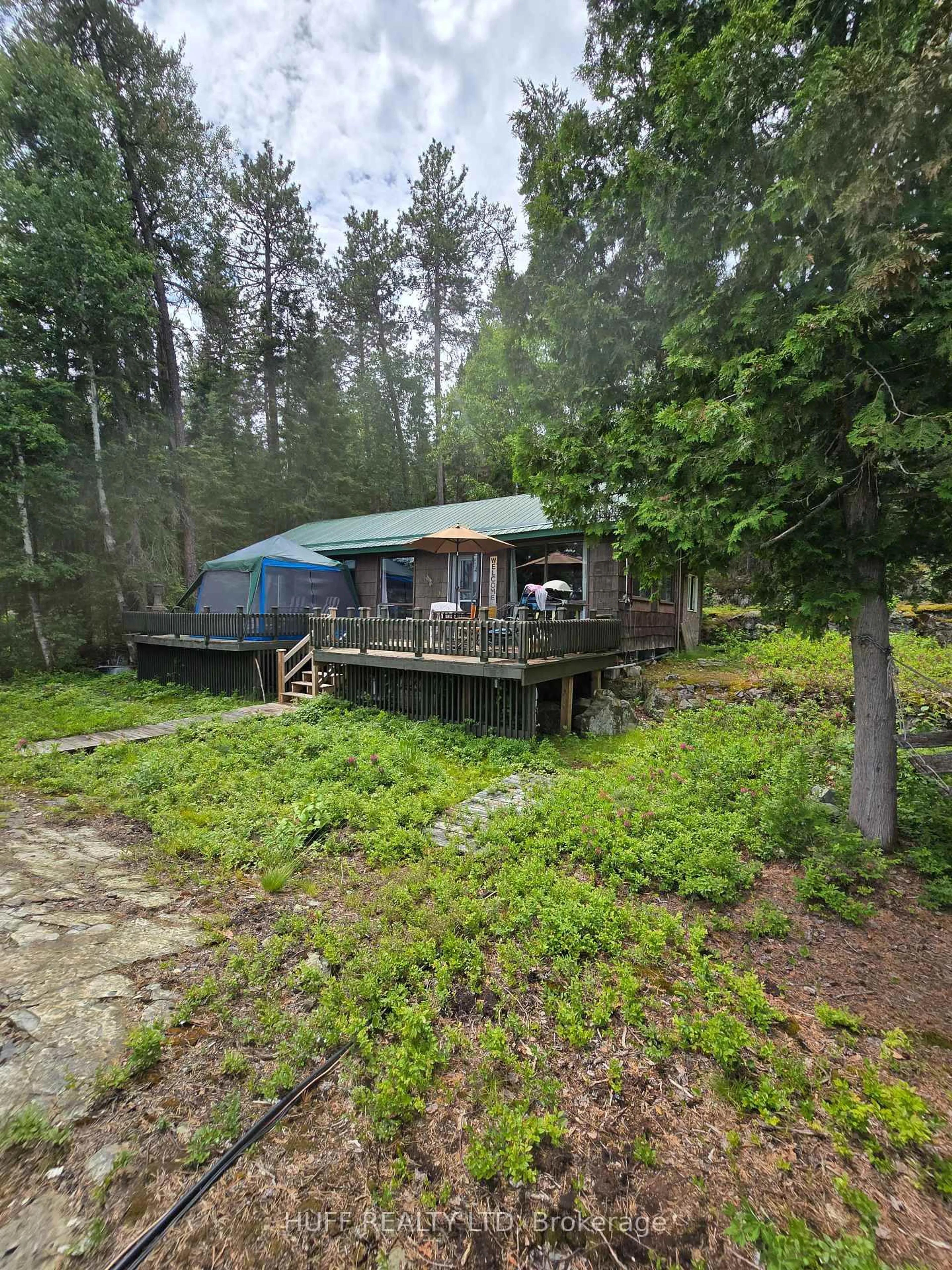 A pic from outside/outdoor area/front of a property/back of a property/a pic from drone, forest/trees view for Lot 1 Wendigo Lake, Englehart Ontario P0J 1H0