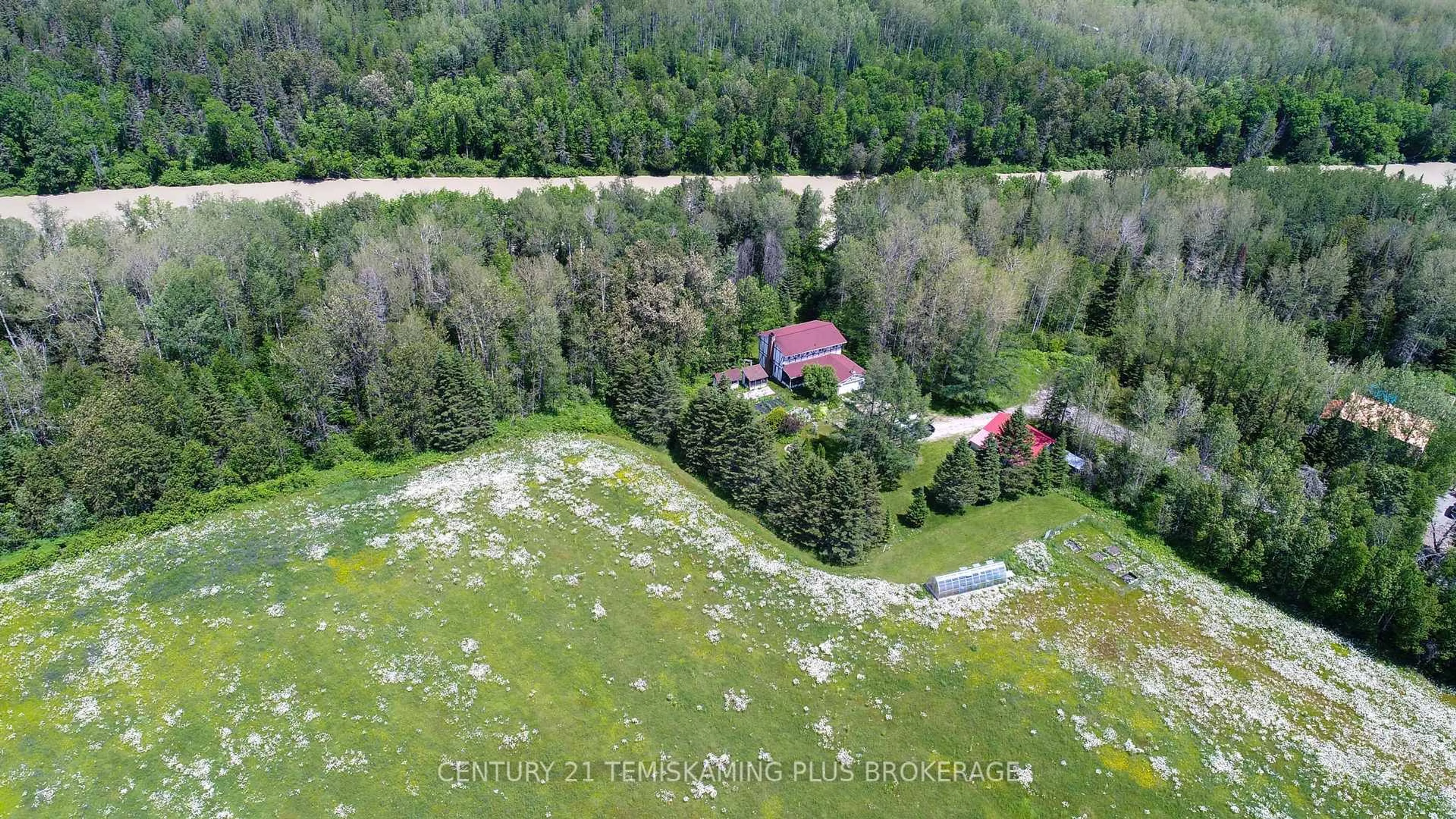 A pic from outside/outdoor area/front of a property/back of a property/a pic from drone, forest/trees view for 234038 Dairy Lane, Englehart Ontario P0J 1H0
