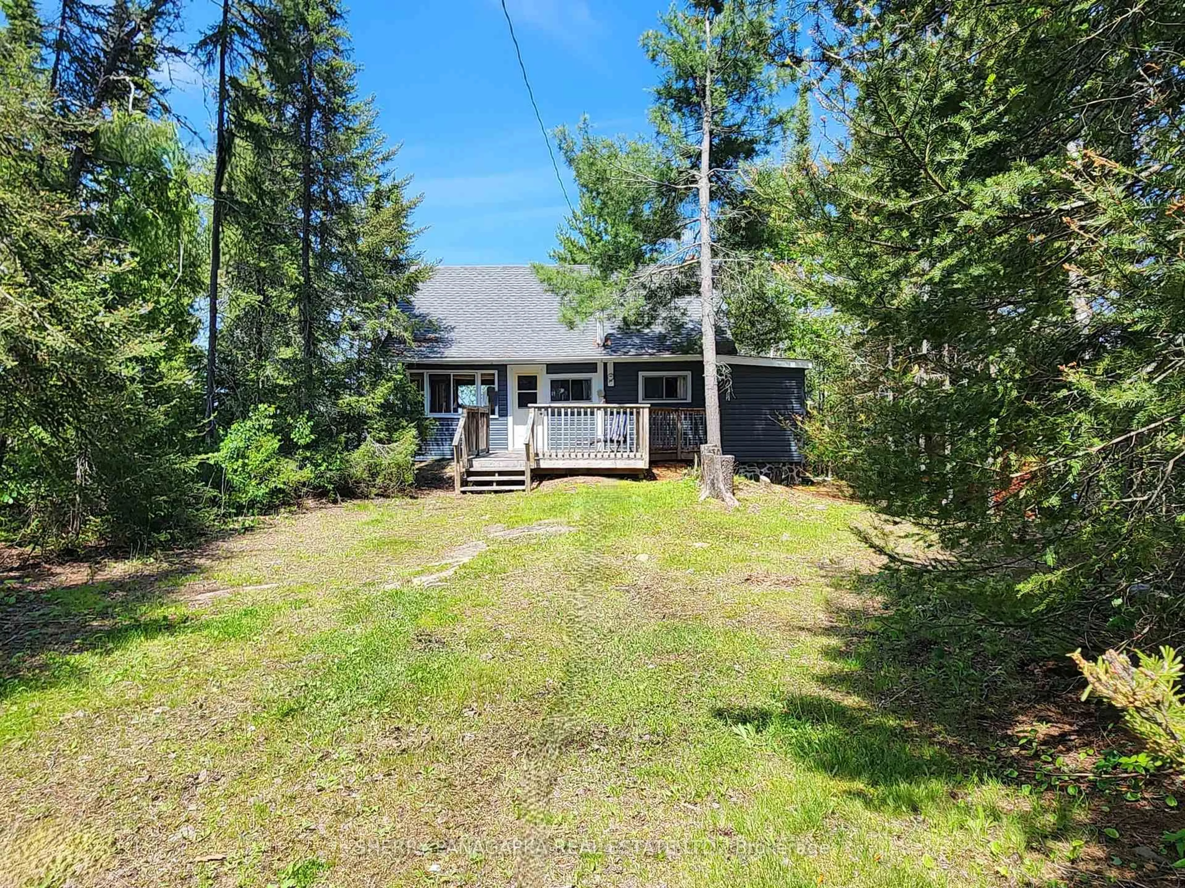 A pic from outside/outdoor area/front of a property/back of a property/a pic from drone, forest/trees view for 258 Silvertire Rd, Kirkland Lake Ontario P0K 1S0