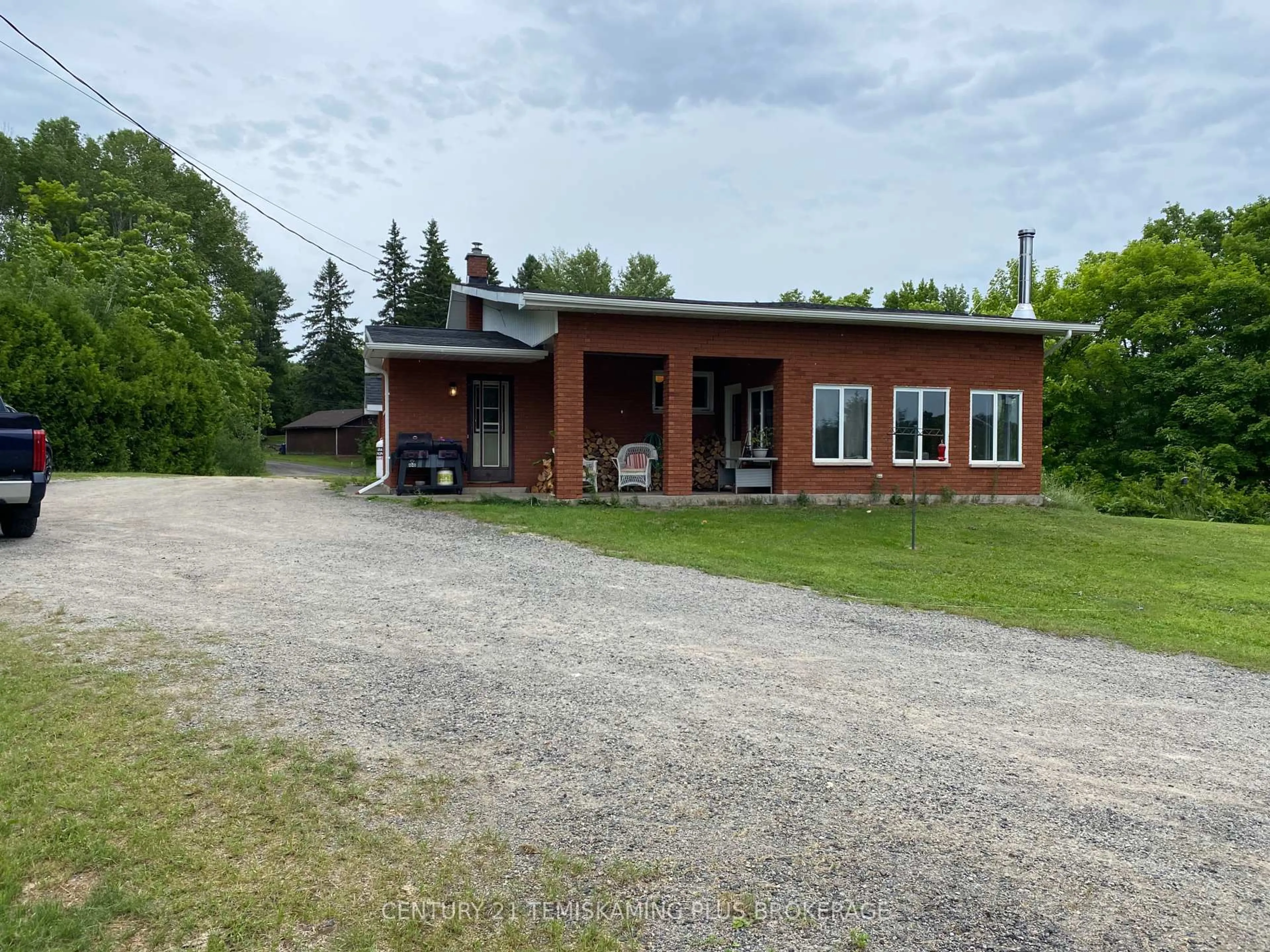 A pic from outside/outdoor area/front of a property/back of a property/a pic from drone, building for 858013 Short St, Timiskaming Ontario P0J 1C0
