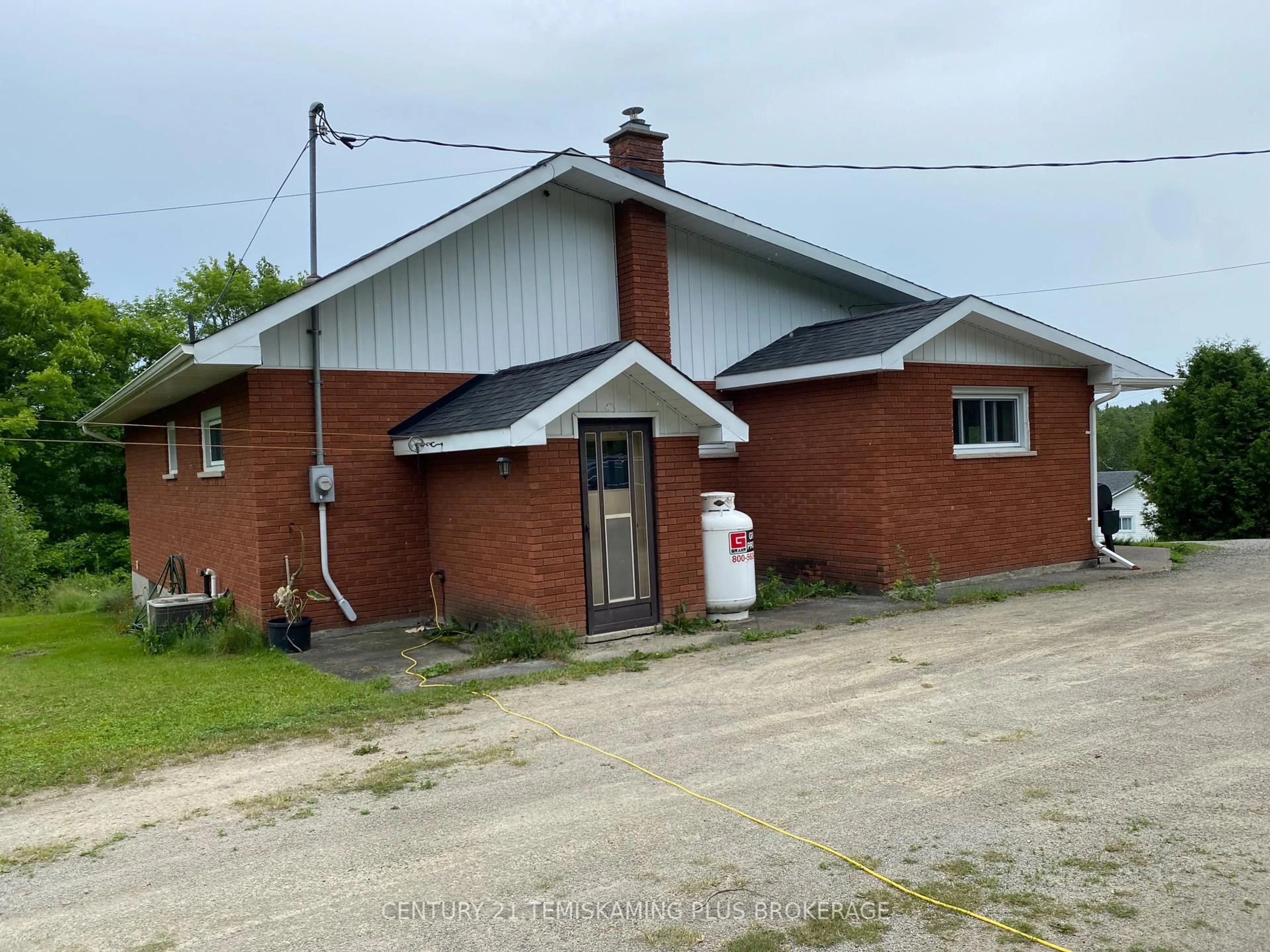 A pic from outside/outdoor area/front of a property/back of a property/a pic from drone, building for 858013 Short St, Timiskaming Ontario P0J 1C0