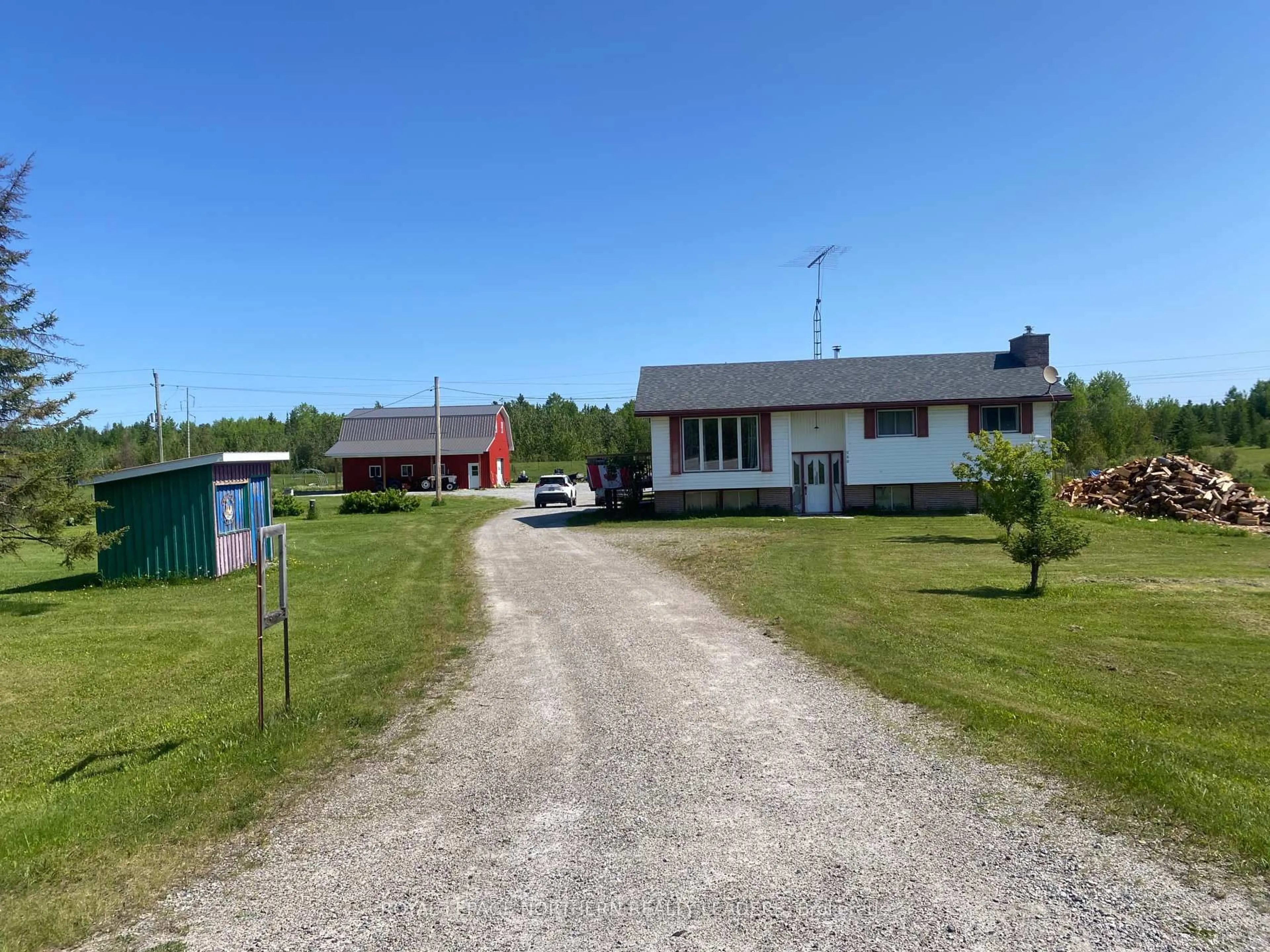 A pic from outside/outdoor area/front of a property/back of a property/a pic from drone, unknown for 211 11 Highway, Fauquier-Strickland Ontario P0L 1G0