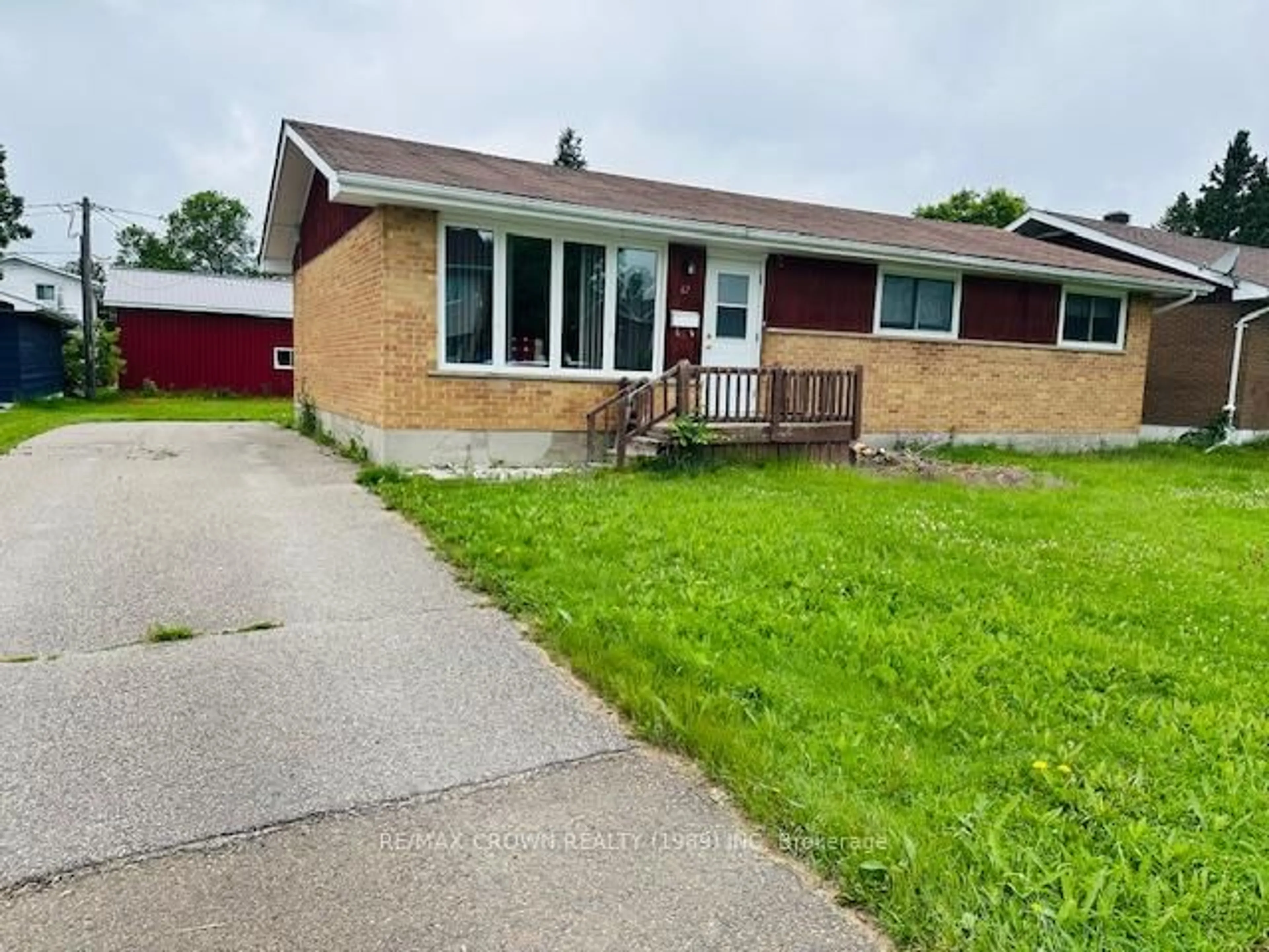 Home with brick exterior material, street for 12 Winnipeg St, Kapuskasing Ontario P5N 1Z2
