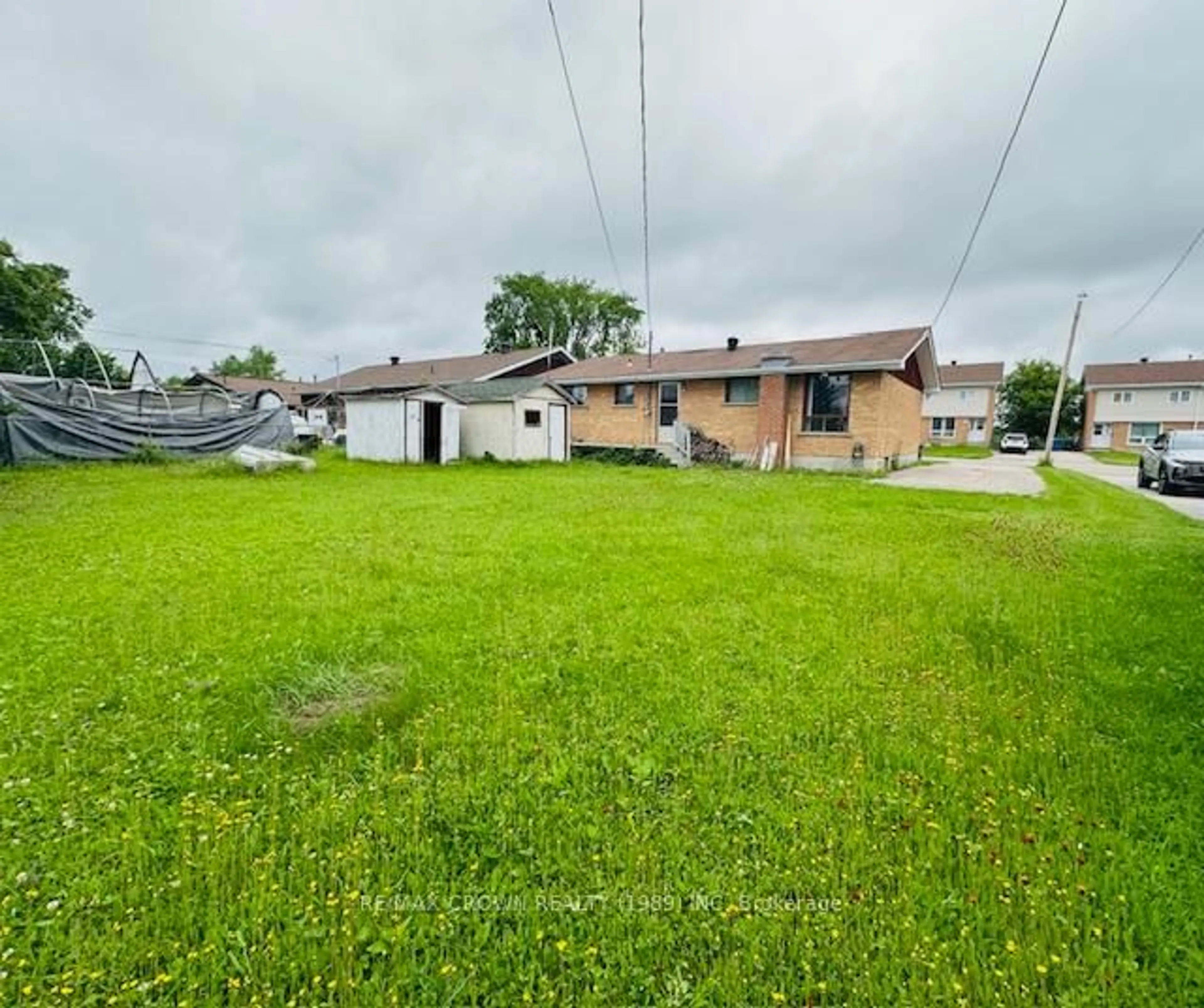 A pic from outside/outdoor area/front of a property/back of a property/a pic from drone, street for 12 Winnipeg St, Kapuskasing Ontario P5N 1Z2