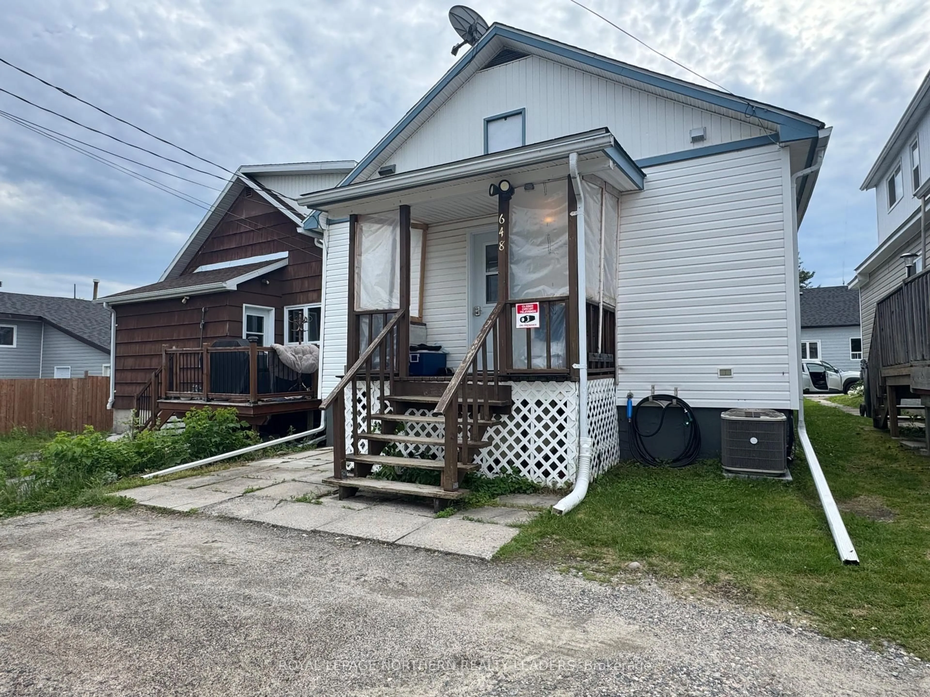 A pic from outside/outdoor area/front of a property/back of a property/a pic from drone, street for 648 Synagogue Ave, Iroquois Falls Ontario P0K 1G0
