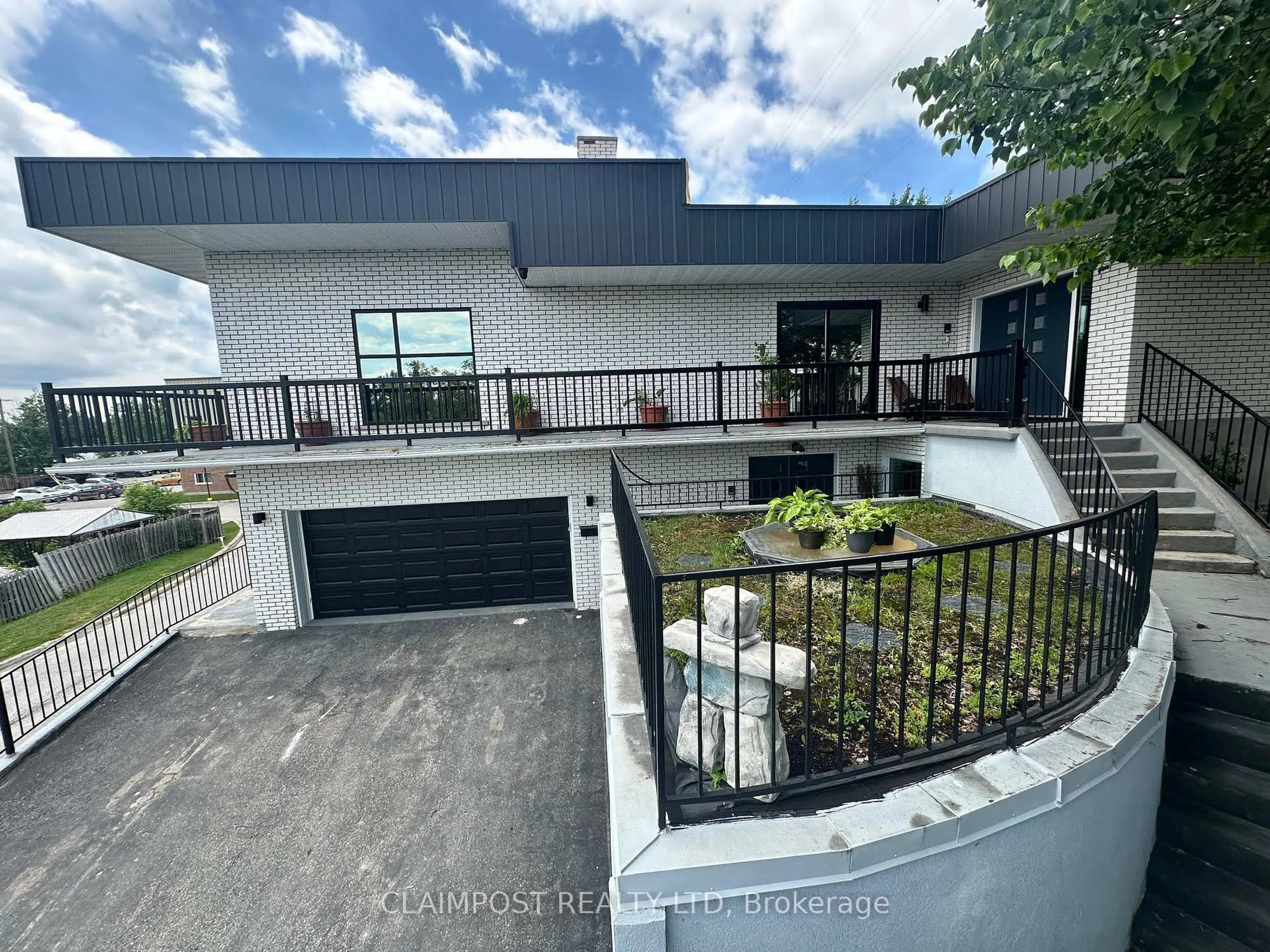 A pic from outside/outdoor area/front of a property/back of a property/a pic from drone, street for 651 Cedar St, Timmins Ontario P4N 7Y5