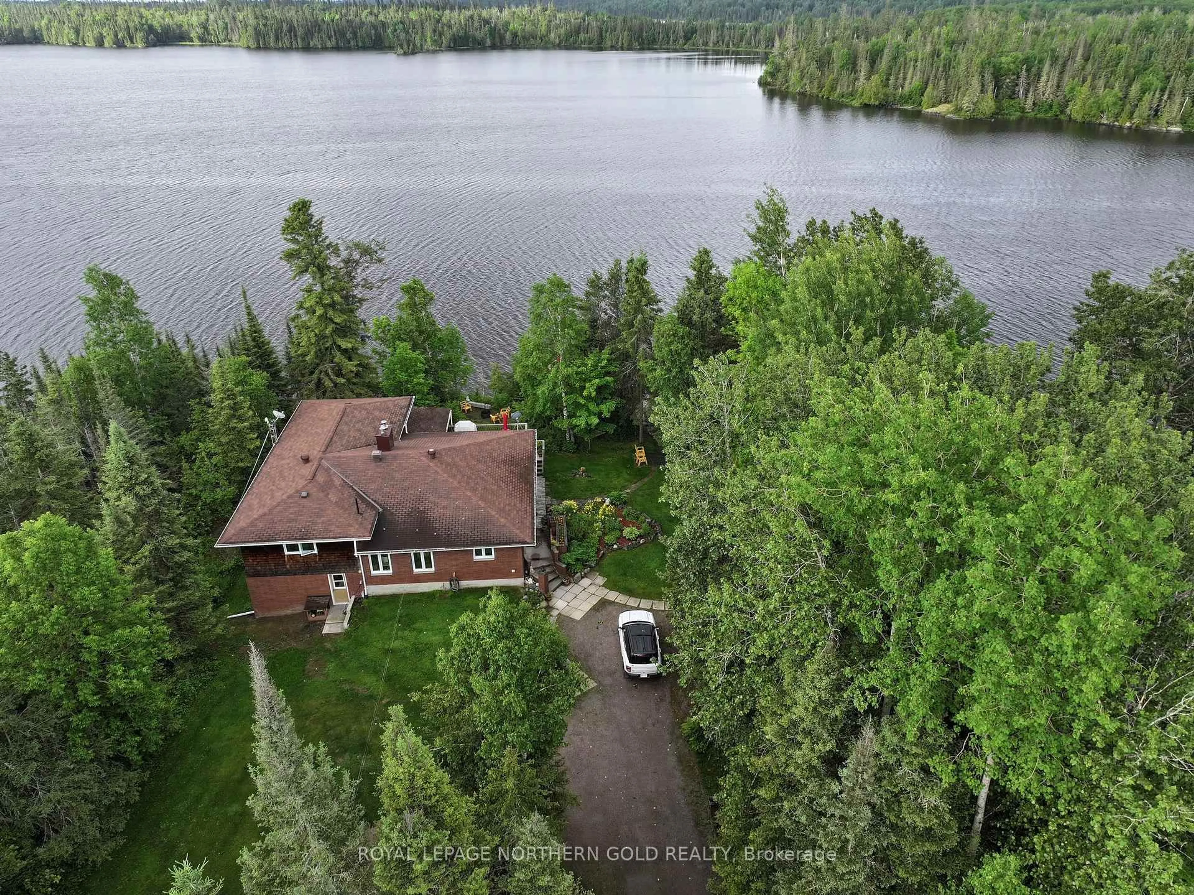 A pic from outside/outdoor area/front of a property/back of a property/a pic from drone, water/lake/river/ocean view for 466 Grenfell Rd, Kirkland Lake Ontario P0K 1T0