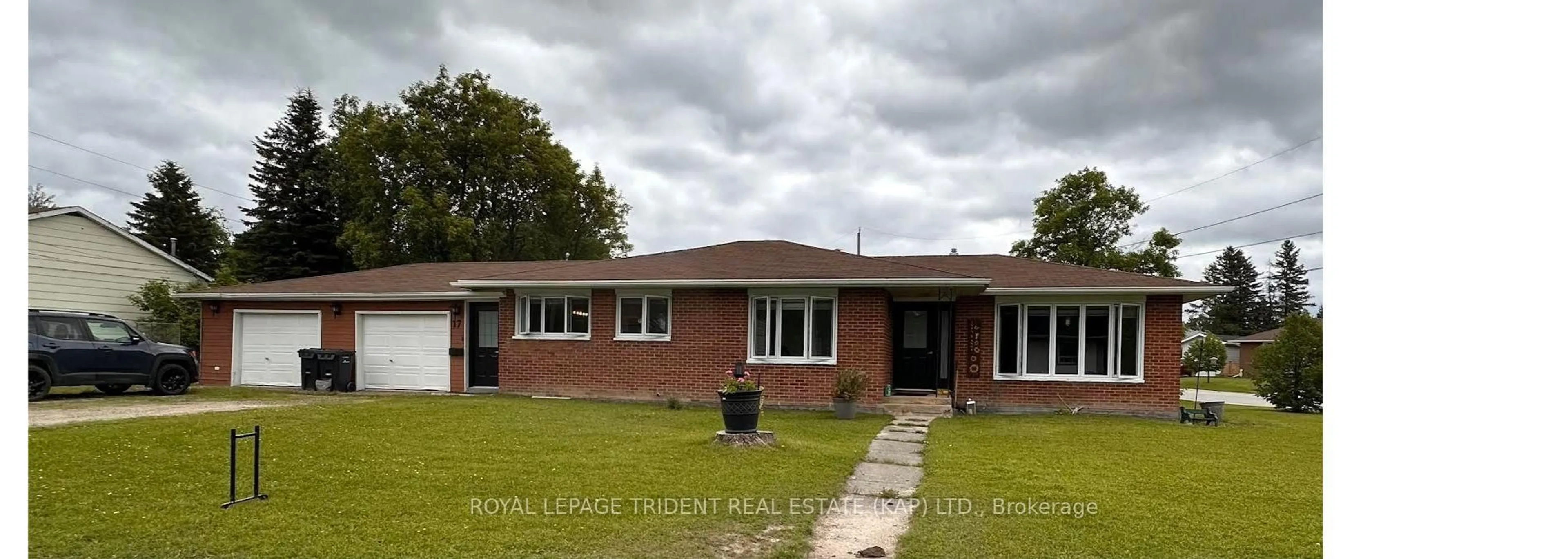 Home with brick exterior material, street for 17 Ash St, Kapuskasing Ontario P5N 2C9