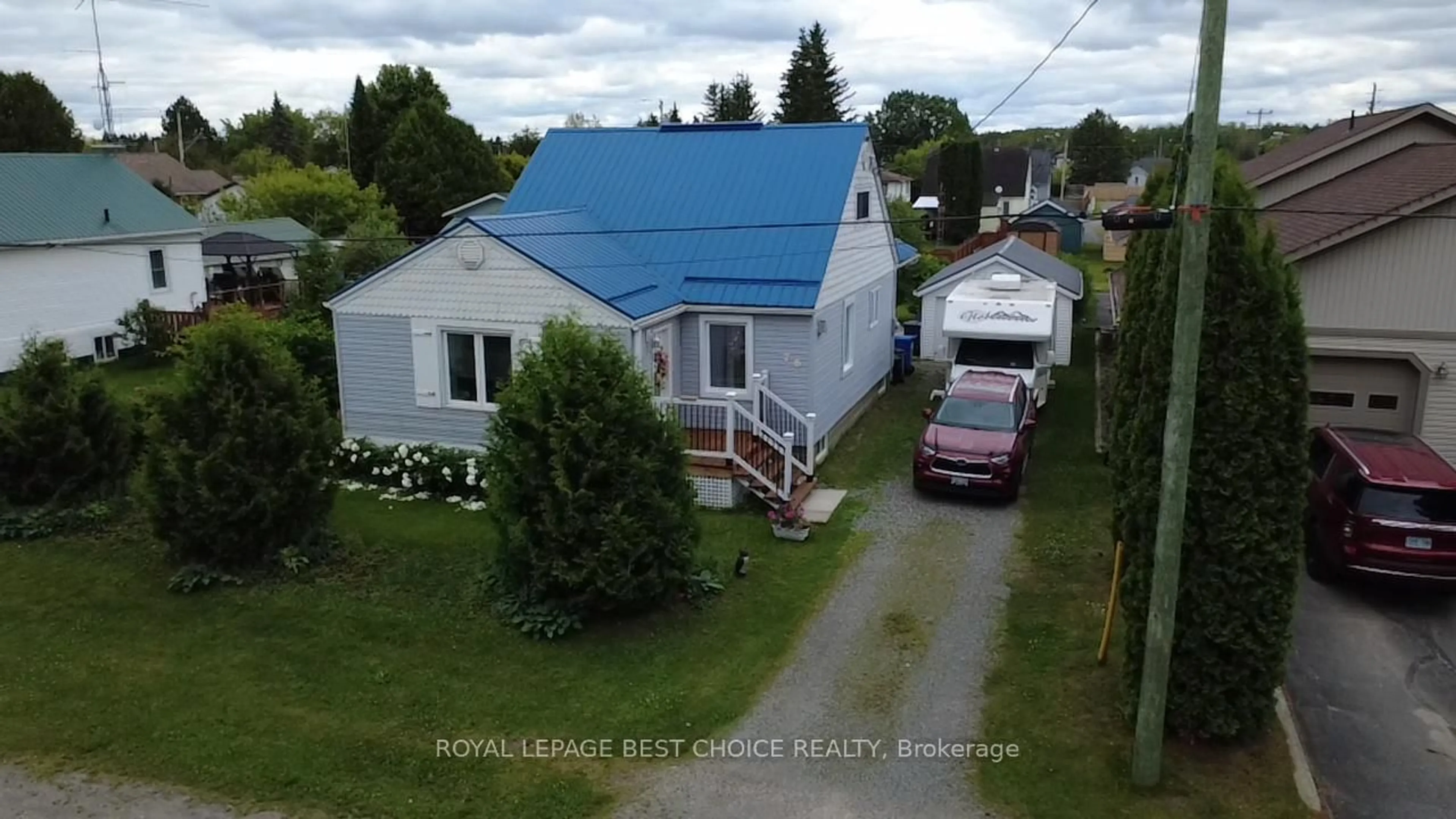 A pic from outside/outdoor area/front of a property/back of a property/a pic from drone, street for 76 Sixth Ave, Englehart Ontario P0J 1H0