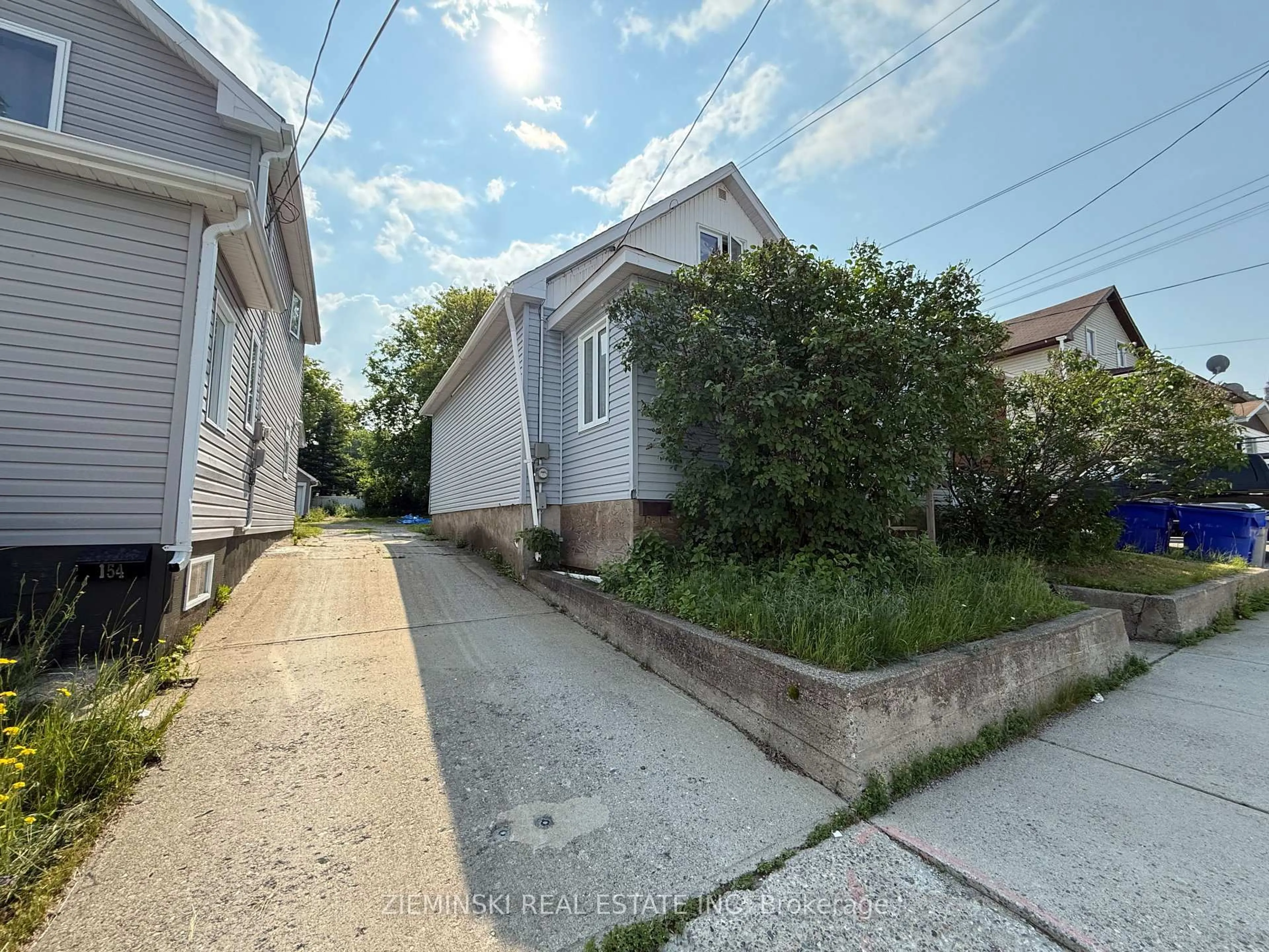 A pic from outside/outdoor area/front of a property/back of a property/a pic from drone, street for 148 Pine St, Timmins Ontario P4N 6L1