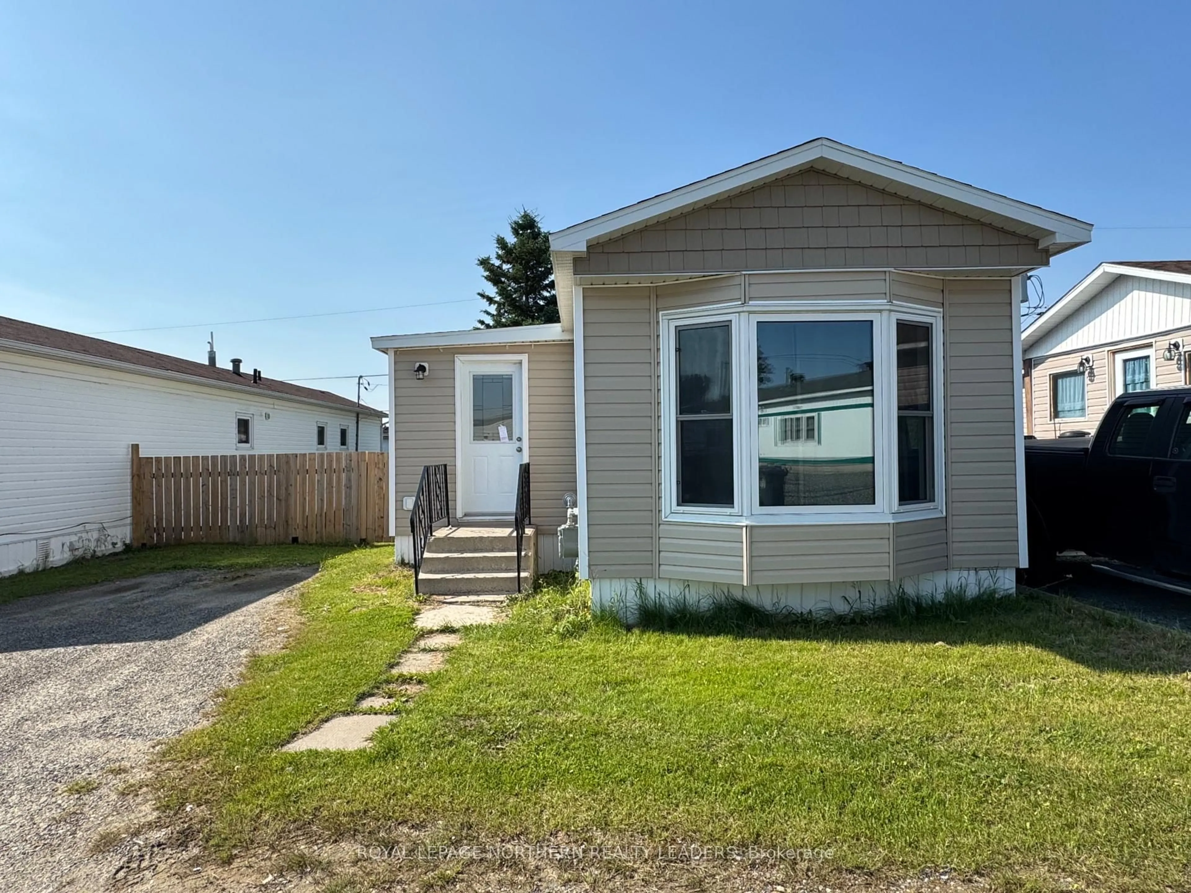 Home with vinyl exterior material, street for 11 Rovie Ave, Timmins Ontario P4N 8R7