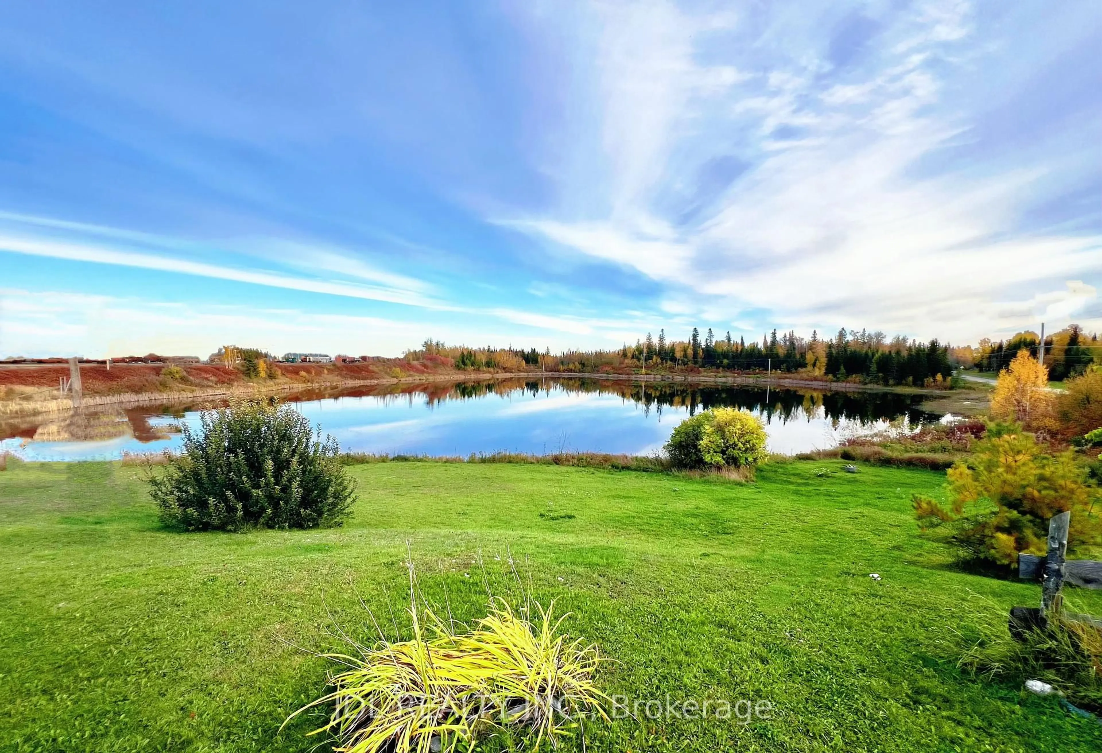 A pic from outside/outdoor area/front of a property/back of a property/a pic from drone, water/lake/river/ocean view for 167 2nd St, Cochrane Ontario P0L 1C0