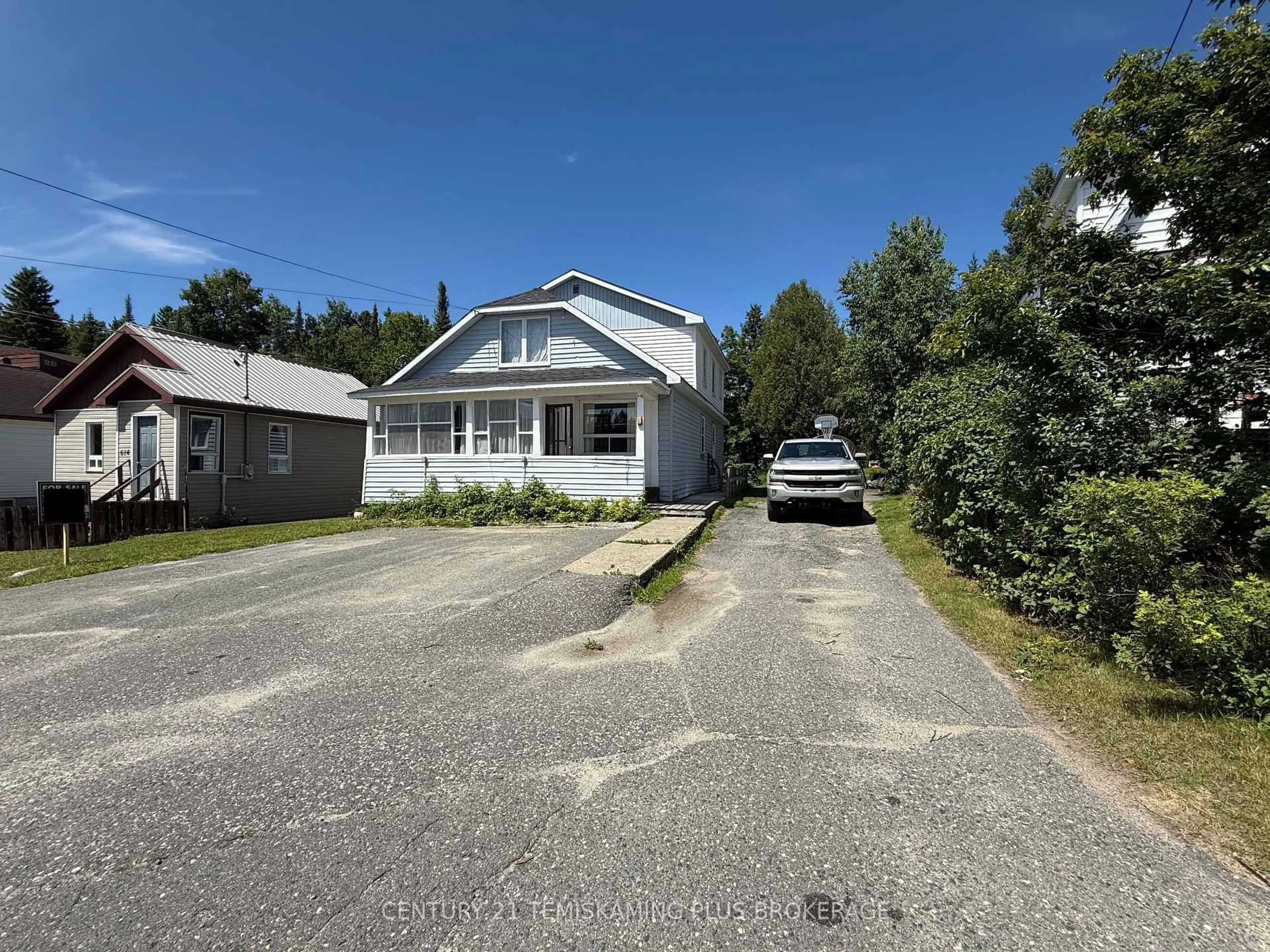 A pic from outside/outdoor area/front of a property/back of a property/a pic from drone, street for 610 Government Rd, Kirkland Lake Ontario P0K 1A0