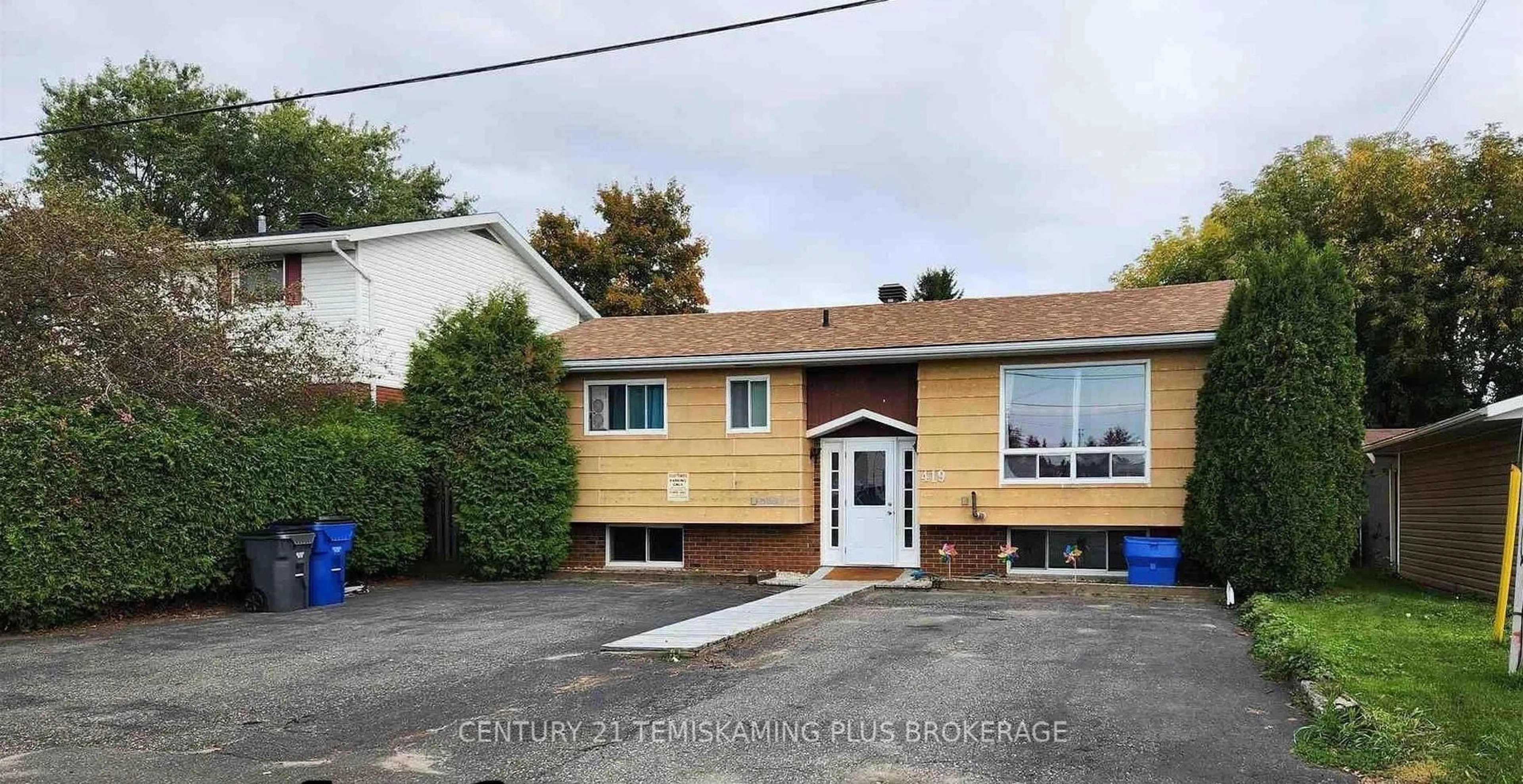 Home with vinyl exterior material, street for 419 Buffam Dr, Temiskaming Shores Ontario P0J 1K0