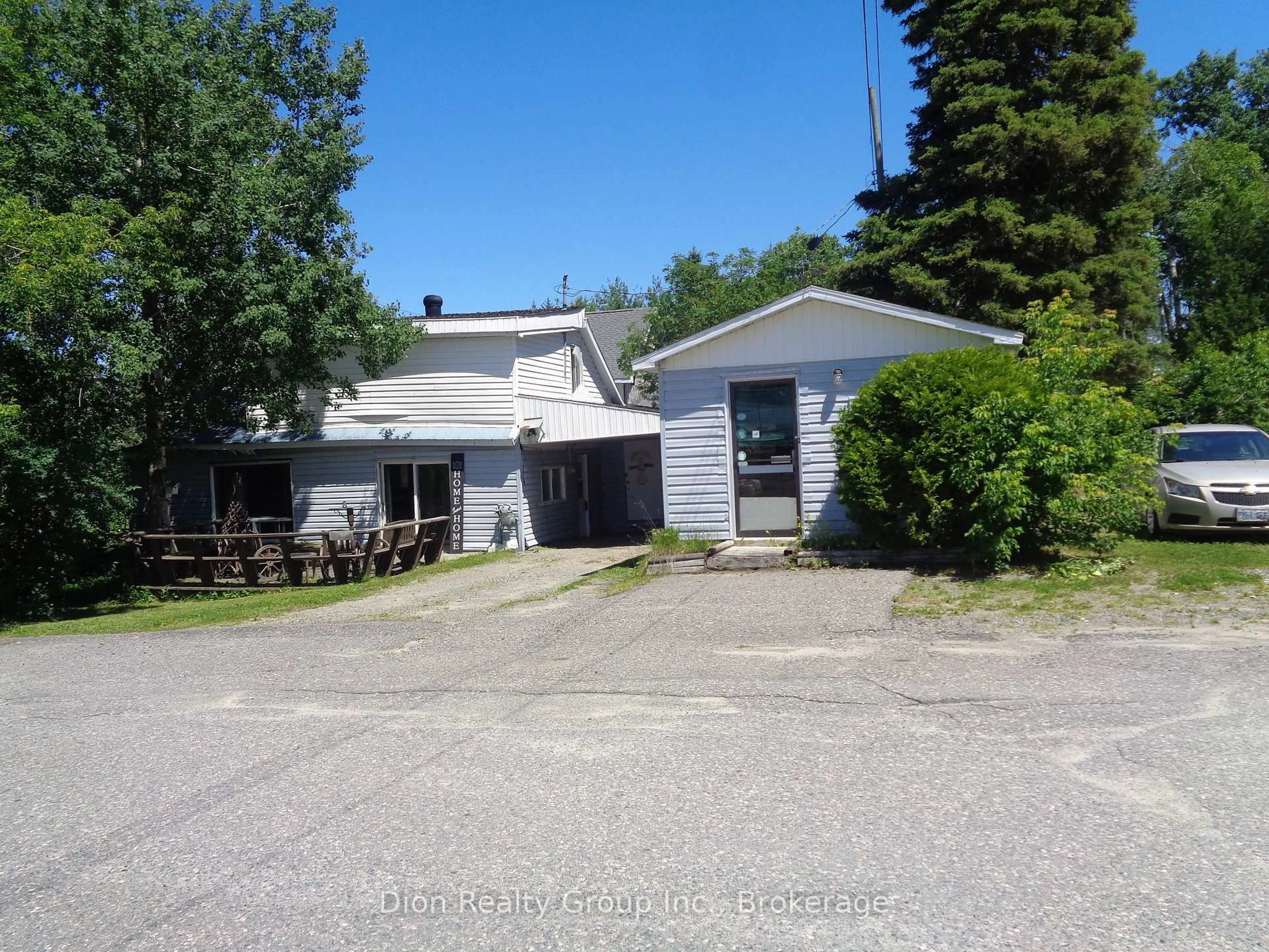 A pic from outside/outdoor area/front of a property/back of a property/a pic from drone, unknown for 511 Government Rd, Kirkland Lake Ontario P0K 1A0