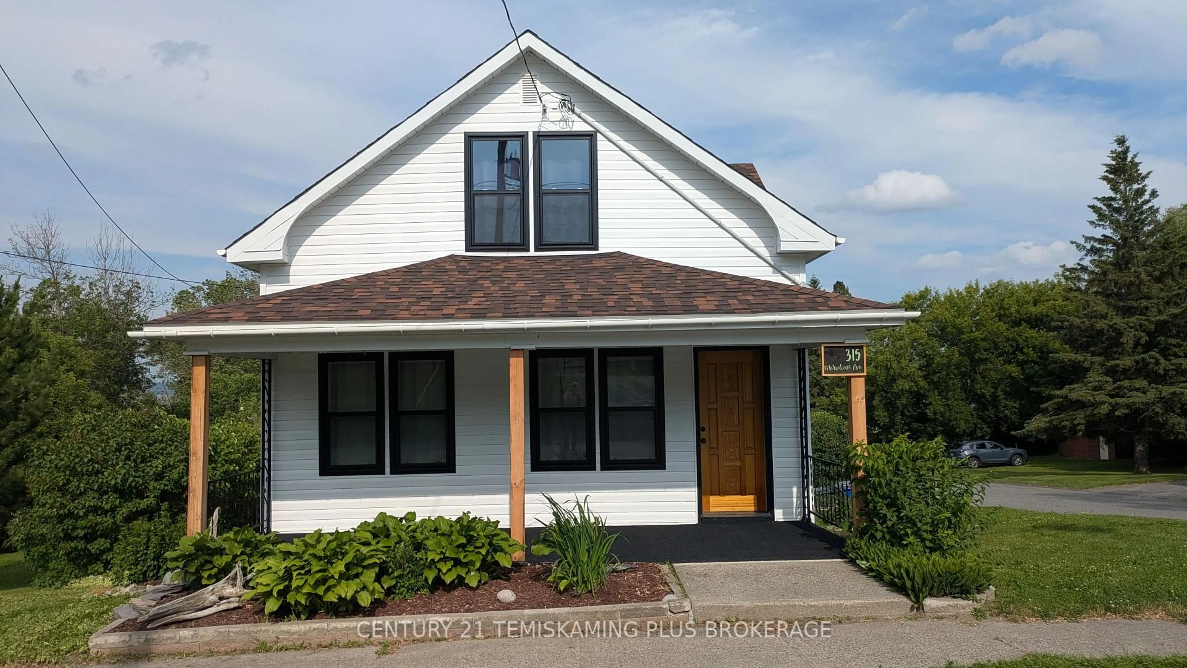 Home with vinyl exterior material, street for 315 Meridian Ave, Temiskaming Shores Ontario P0J 1K0