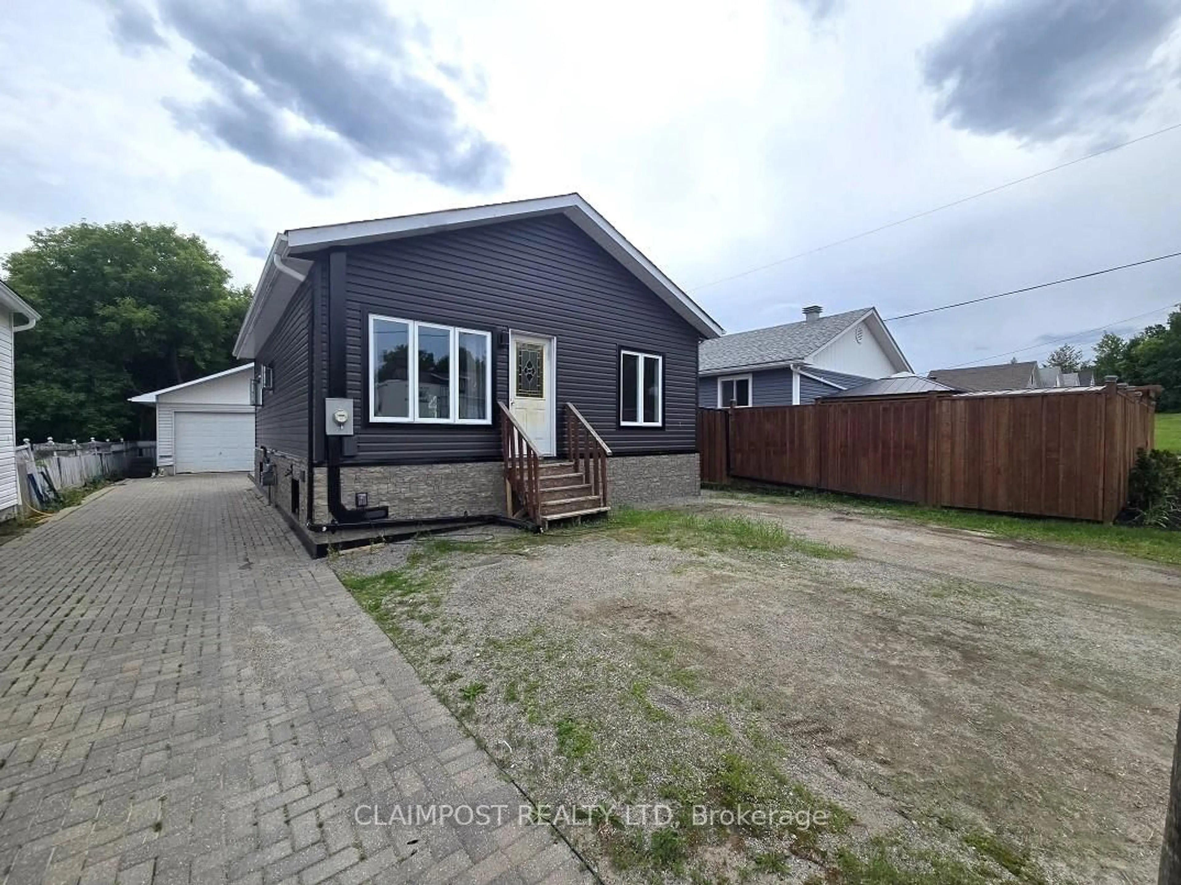 A pic from outside/outdoor area/front of a property/back of a property/a pic from drone, street for 205 Hillside Ave, Timmins Ontario P4N 4J7