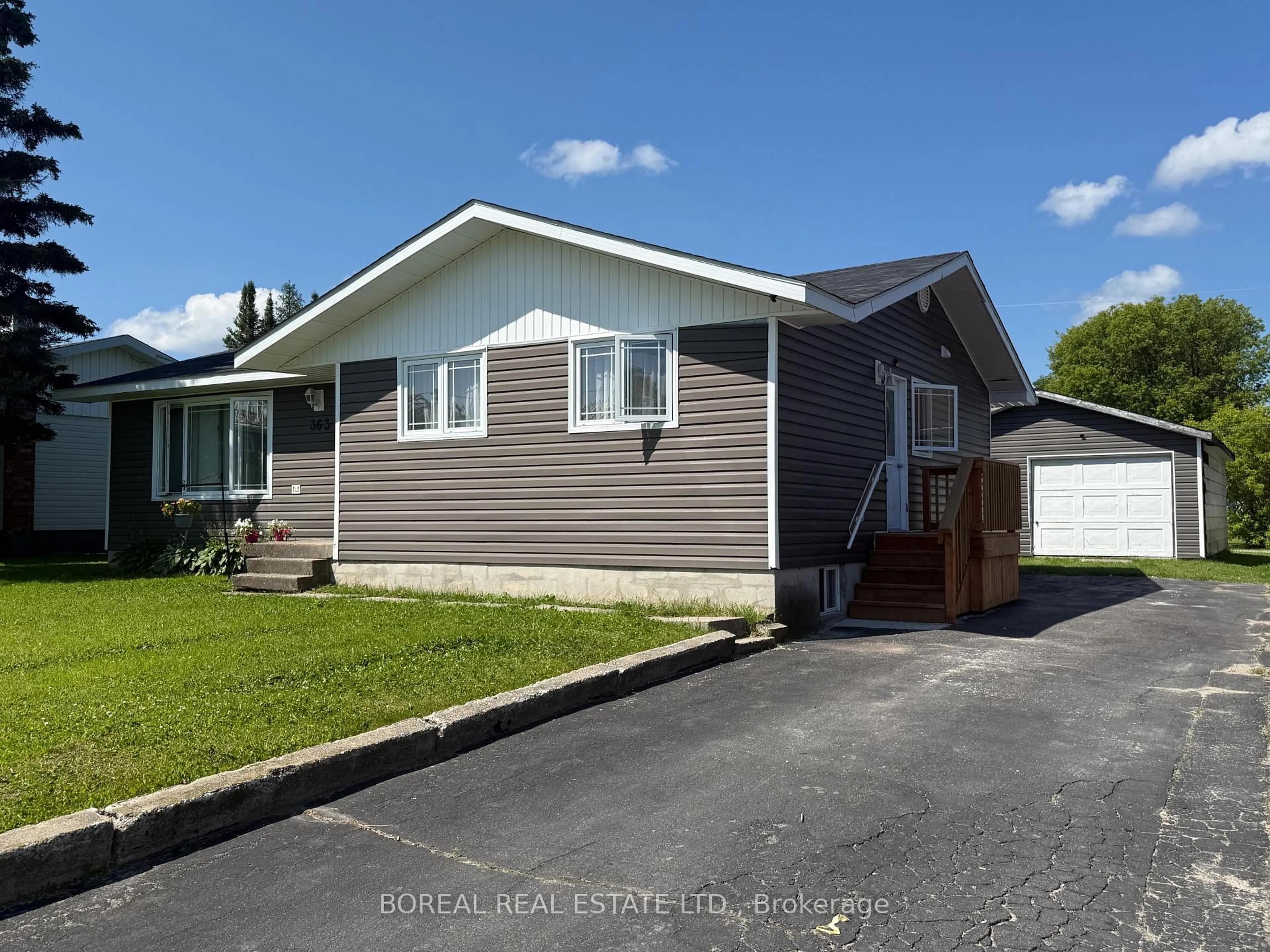 Home with vinyl exterior material, street for 363 Fourteenth Ave, Cochrane Ontario P0L 1C0