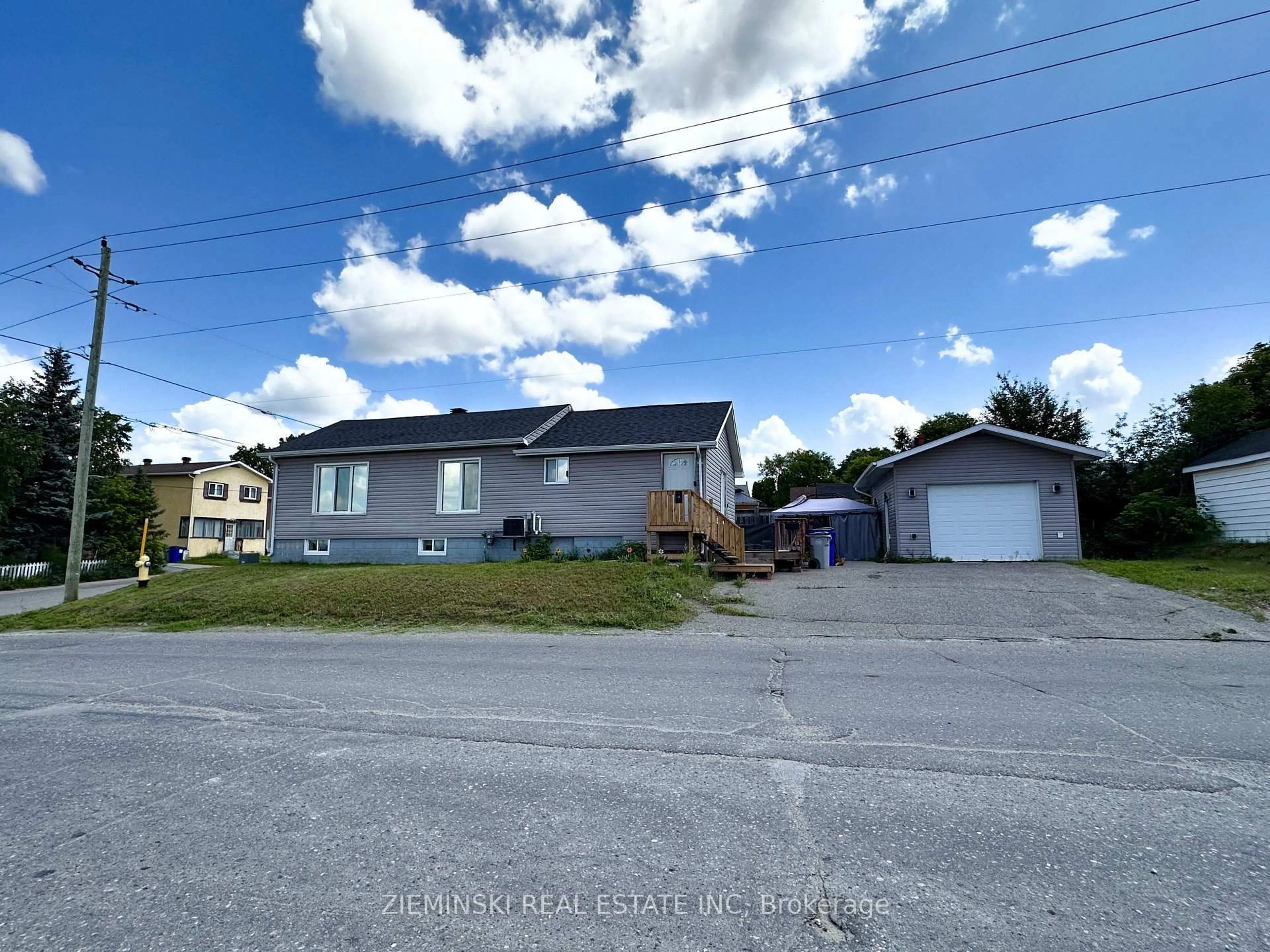 A pic from outside/outdoor area/front of a property/back of a property/a pic from drone, street for 263 Kent Ave, Timmins Ontario P4N 3C2
