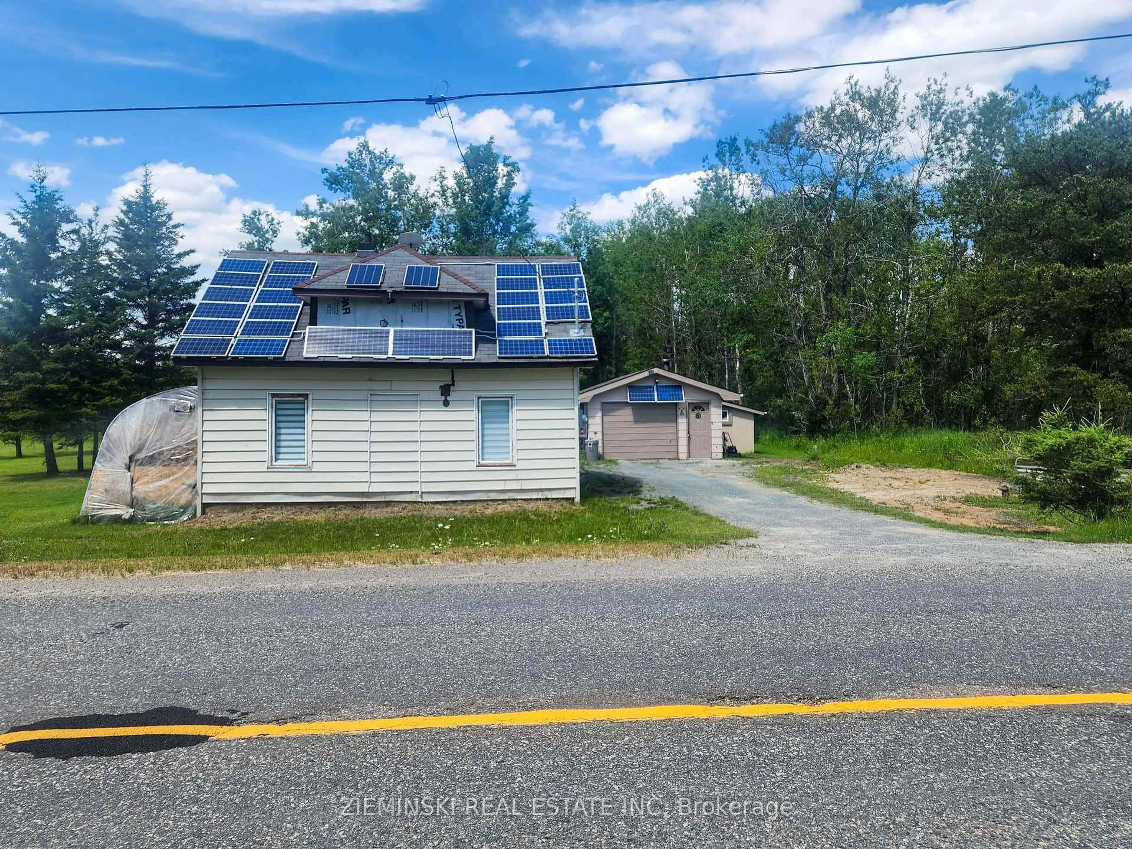 A pic from outside/outdoor area/front of a property/back of a property/a pic from drone, street for 2414 Pearl St, Black River Matheson Ontario P0K 1C0
