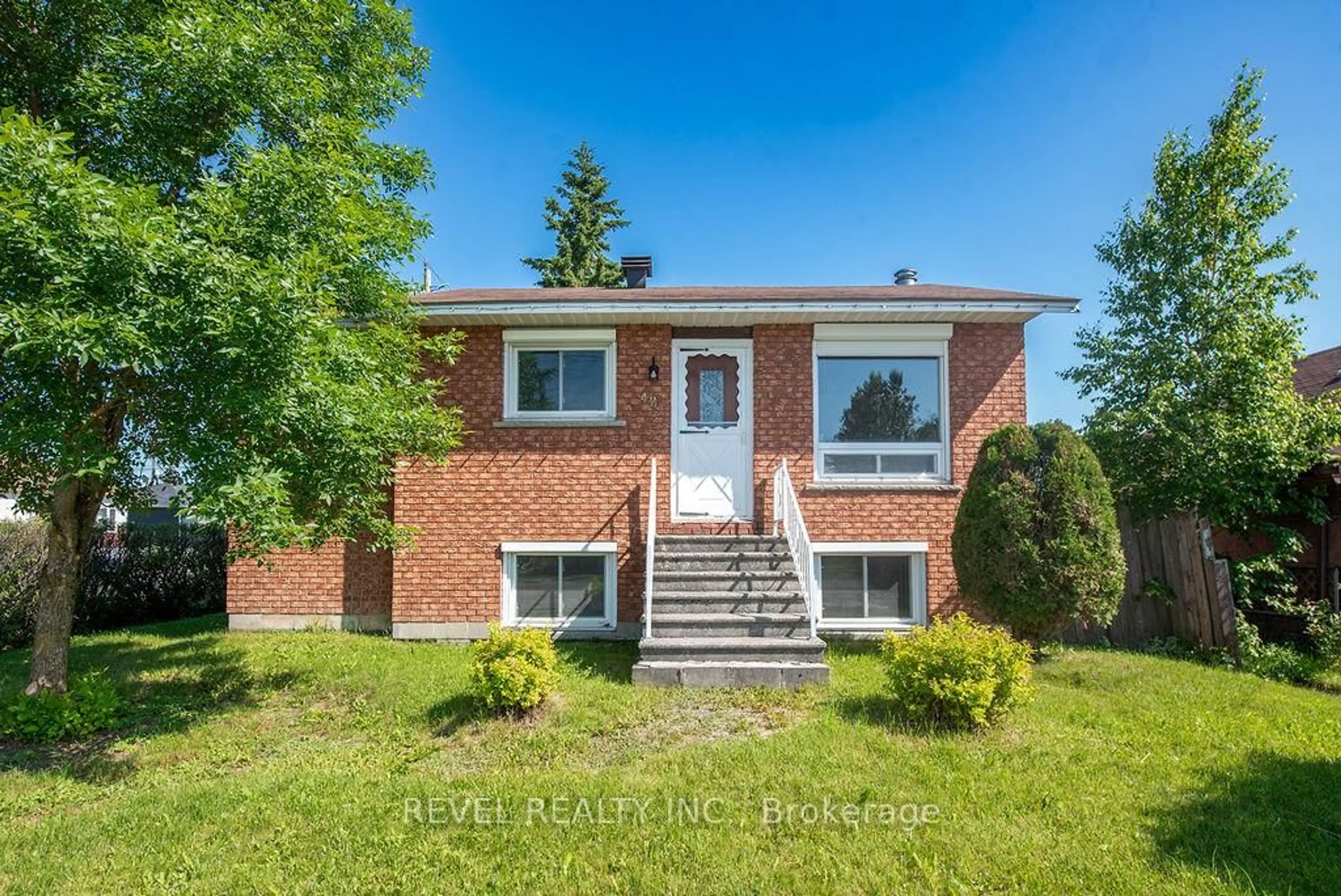Home with brick exterior material, street for 42 Powell Ave, Timmins Ontario P0N 1H0