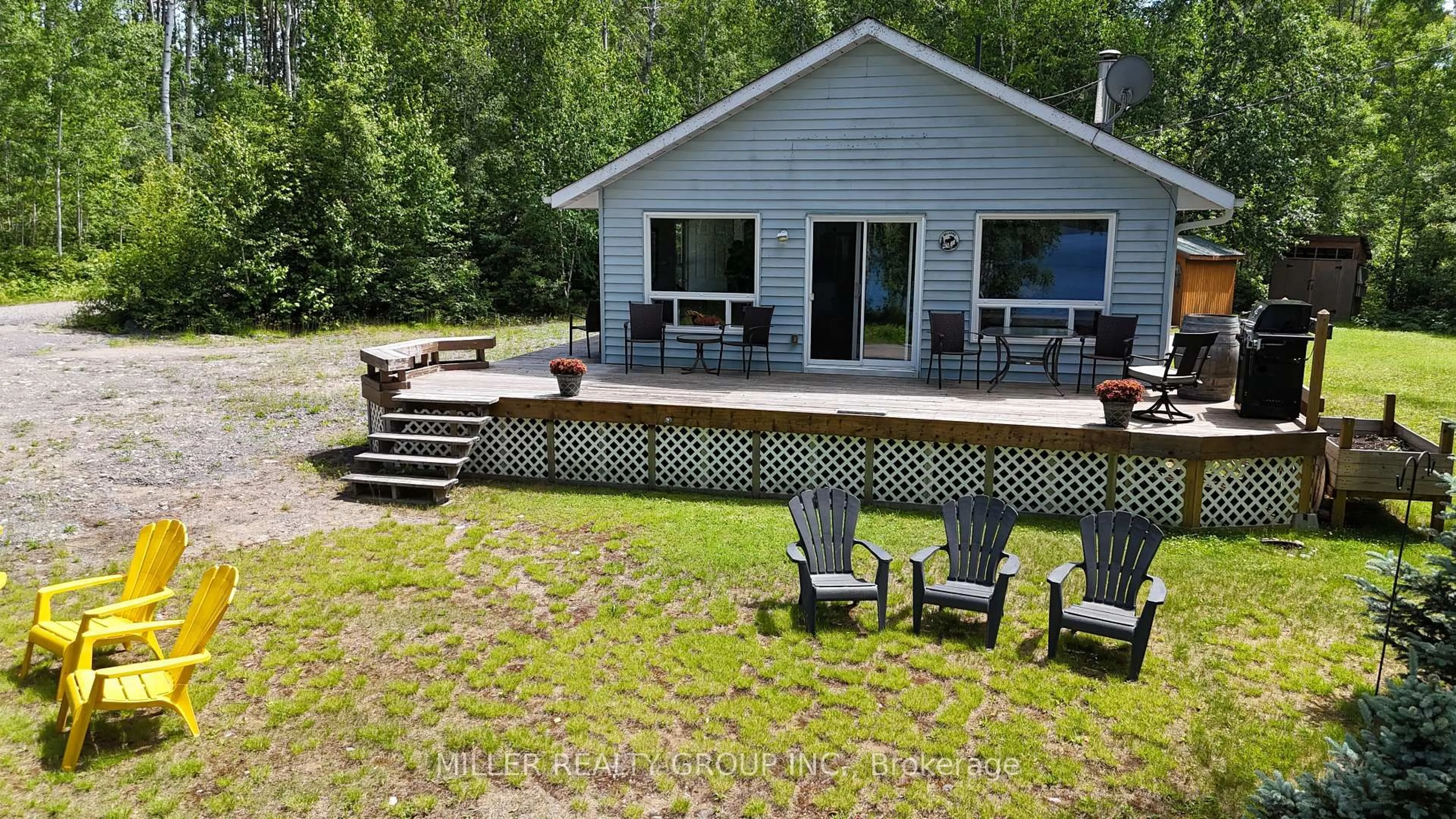 A pic from outside/outdoor area/front of a property/back of a property/a pic from drone, water/lake/river/ocean view for 877501 Bass Lake Rd, Coleman Ontario P0J 1C0