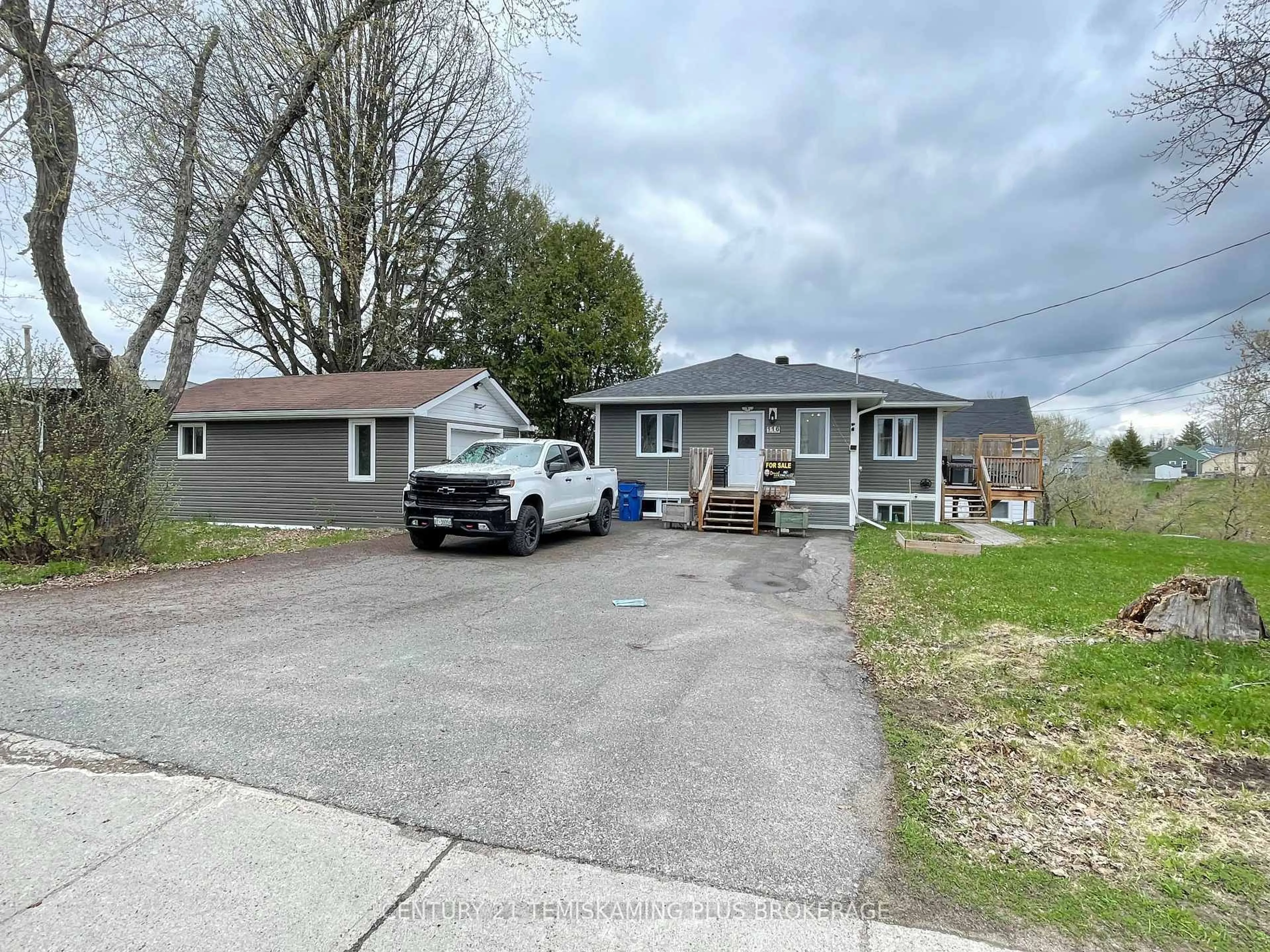 A pic from outside/outdoor area/front of a property/back of a property/a pic from drone, street for 116 Paget St, Temiskaming Shores Ontario P0J 1P0