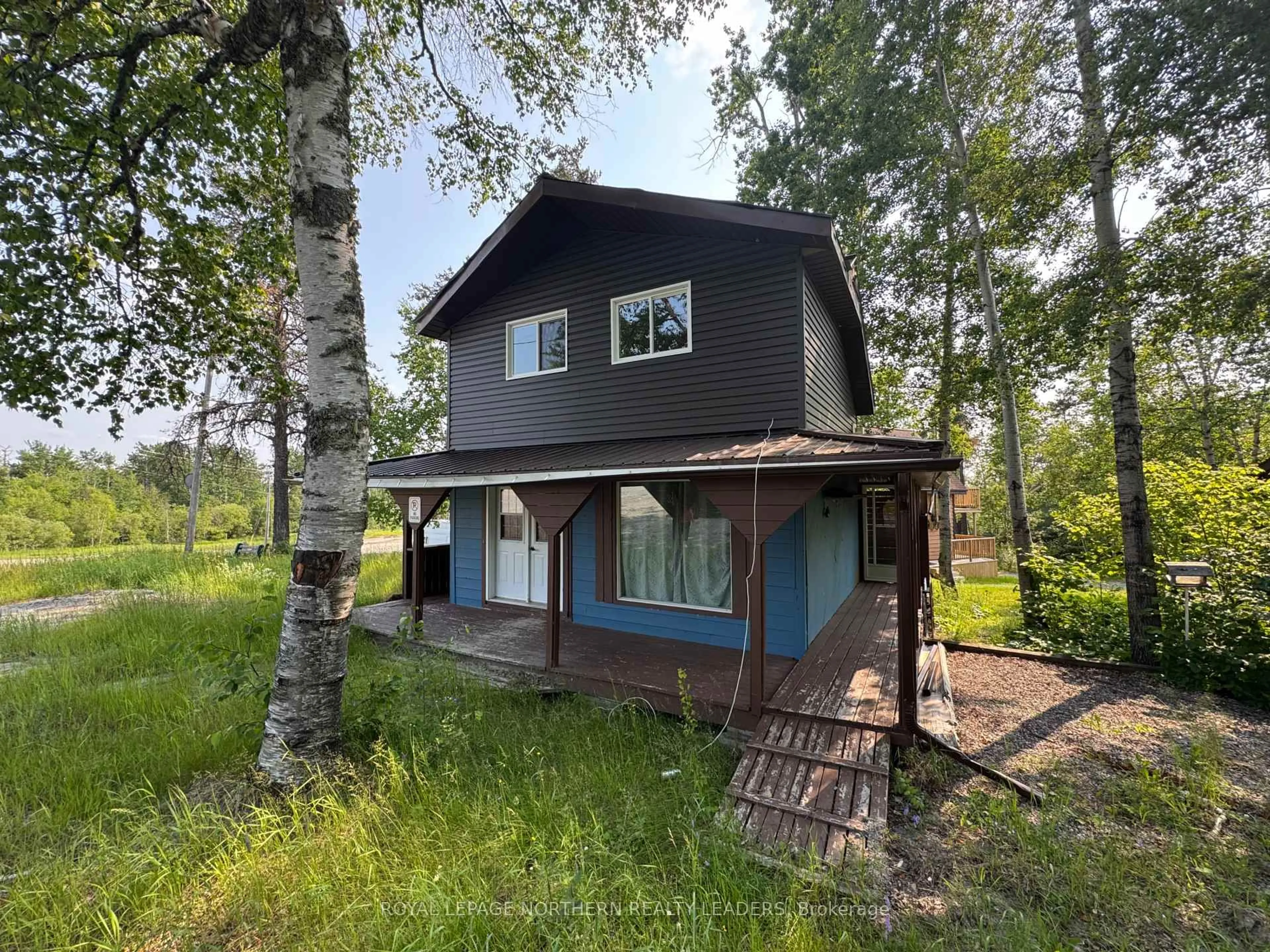 A pic from outside/outdoor area/front of a property/back of a property/a pic from drone, forest/trees view for 4-5050 Kamiskotia Rd, Timmins Ontario P4N 7E3