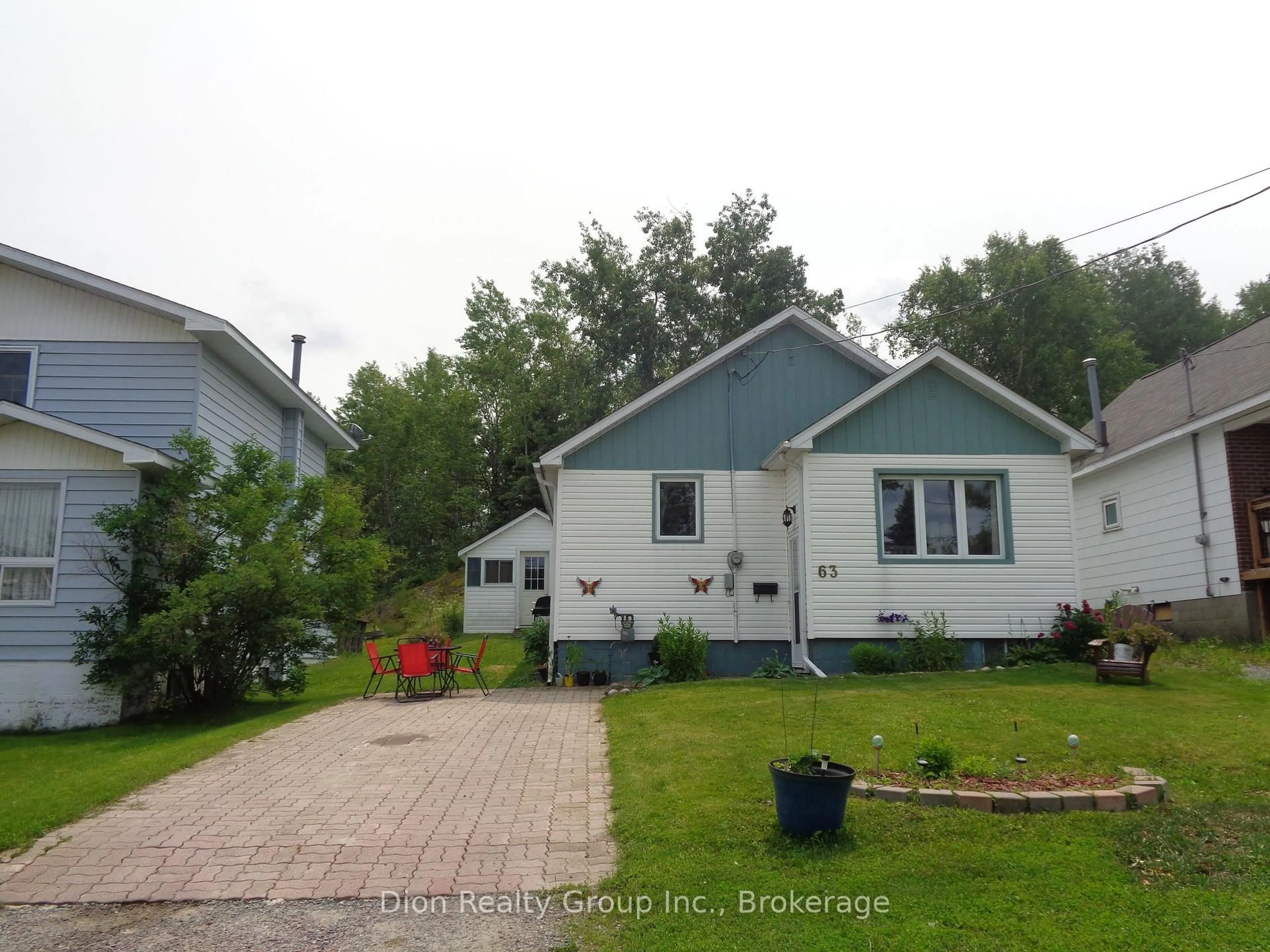 A pic from outside/outdoor area/front of a property/back of a property/a pic from drone, street for 63 First St, Kirkland Lake Ontario P2N 1N2