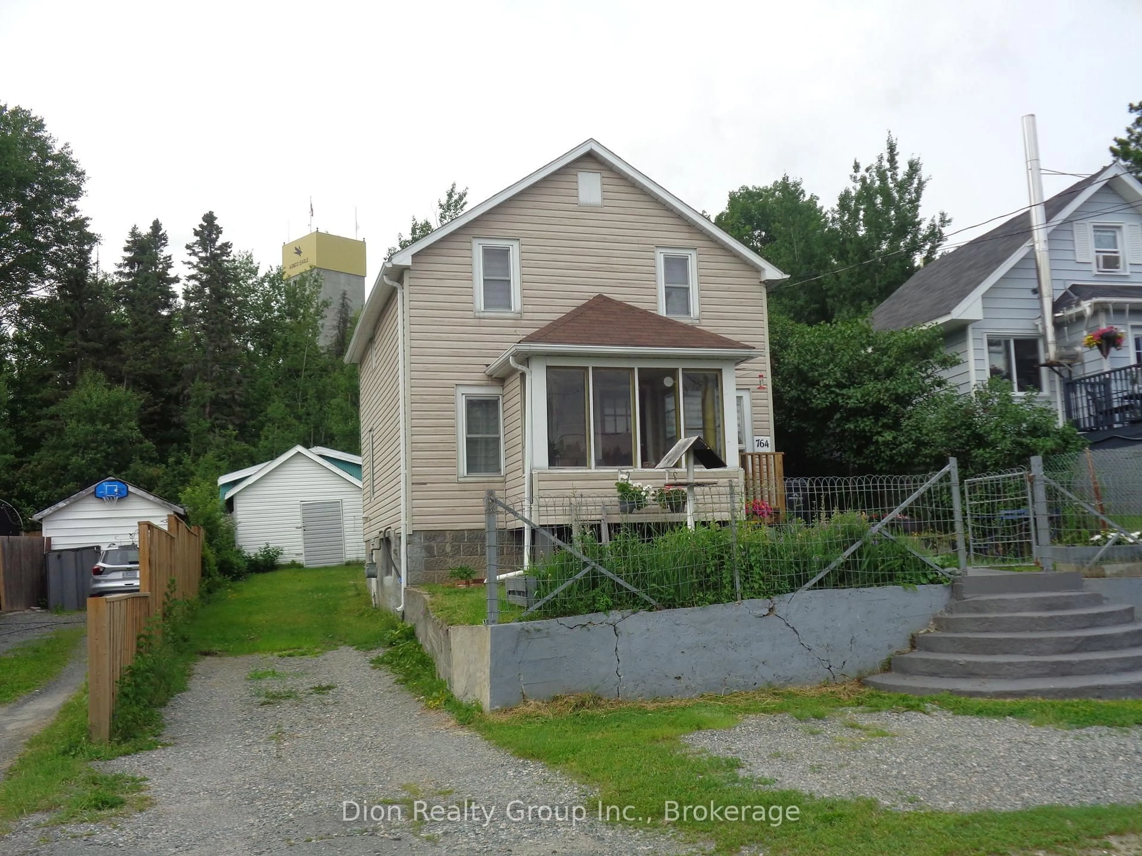 A pic from outside/outdoor area/front of a property/back of a property/a pic from drone, street for 764 Government Rd, Kirkland Lake Ontario P0K 1A0