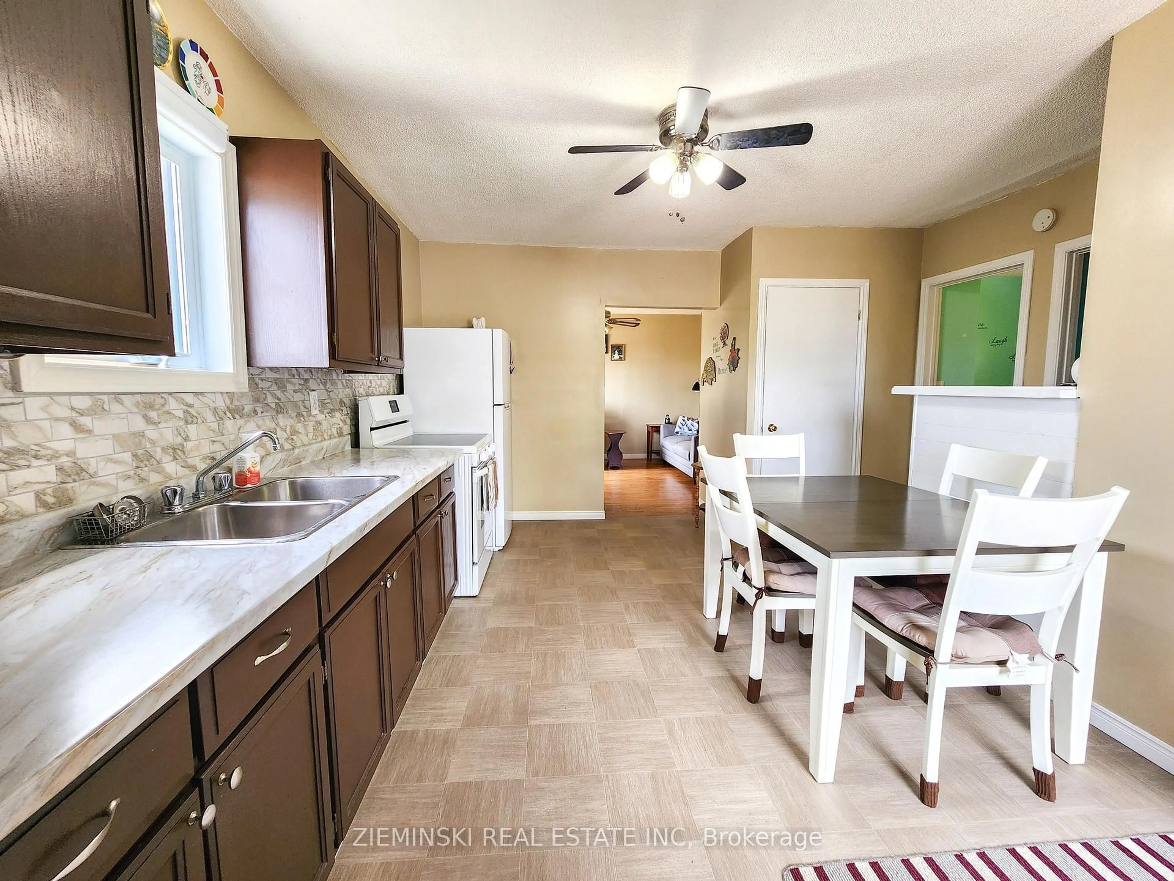 Open concept kitchen, ceramic/tile floor for 142 Anson Dr, Iroquois Falls Ontario P0K 1E0