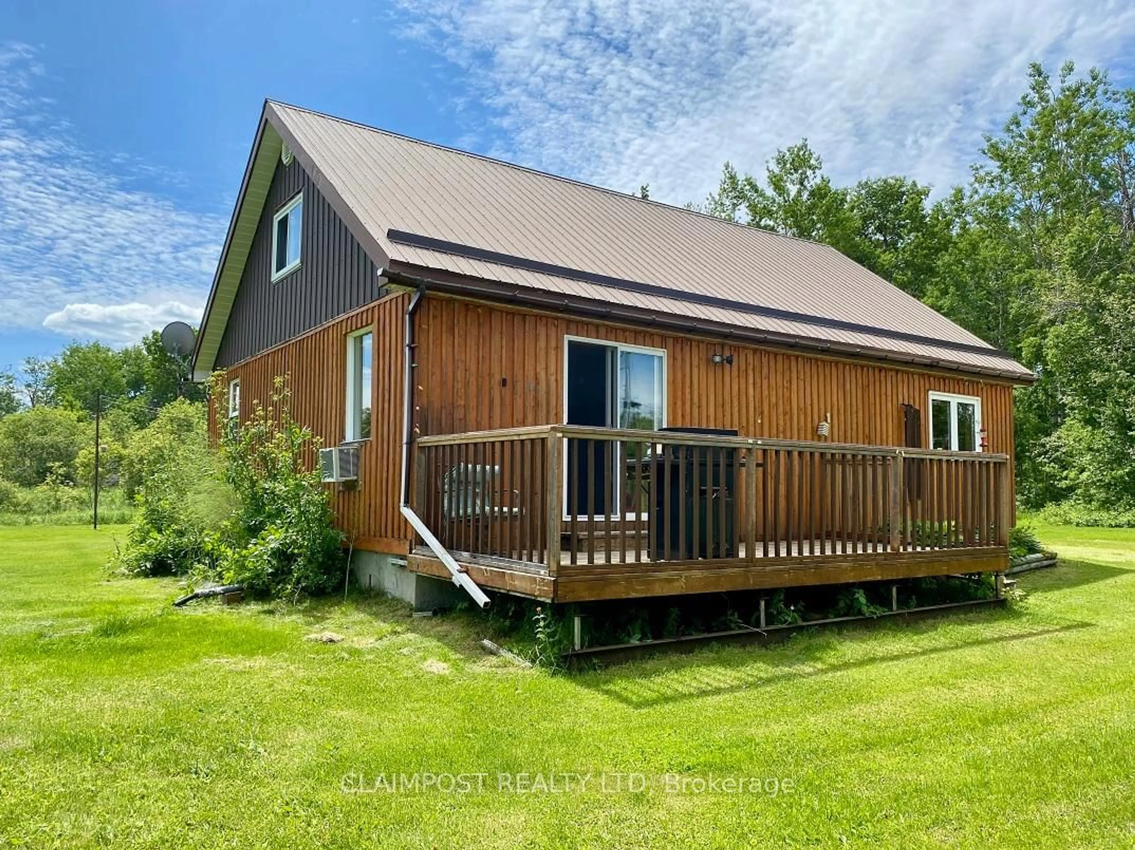 Home with vinyl exterior material, water/lake/river/ocean view for 1182 Cosens Rd, Iroquois Falls Ontario P0N 1E0