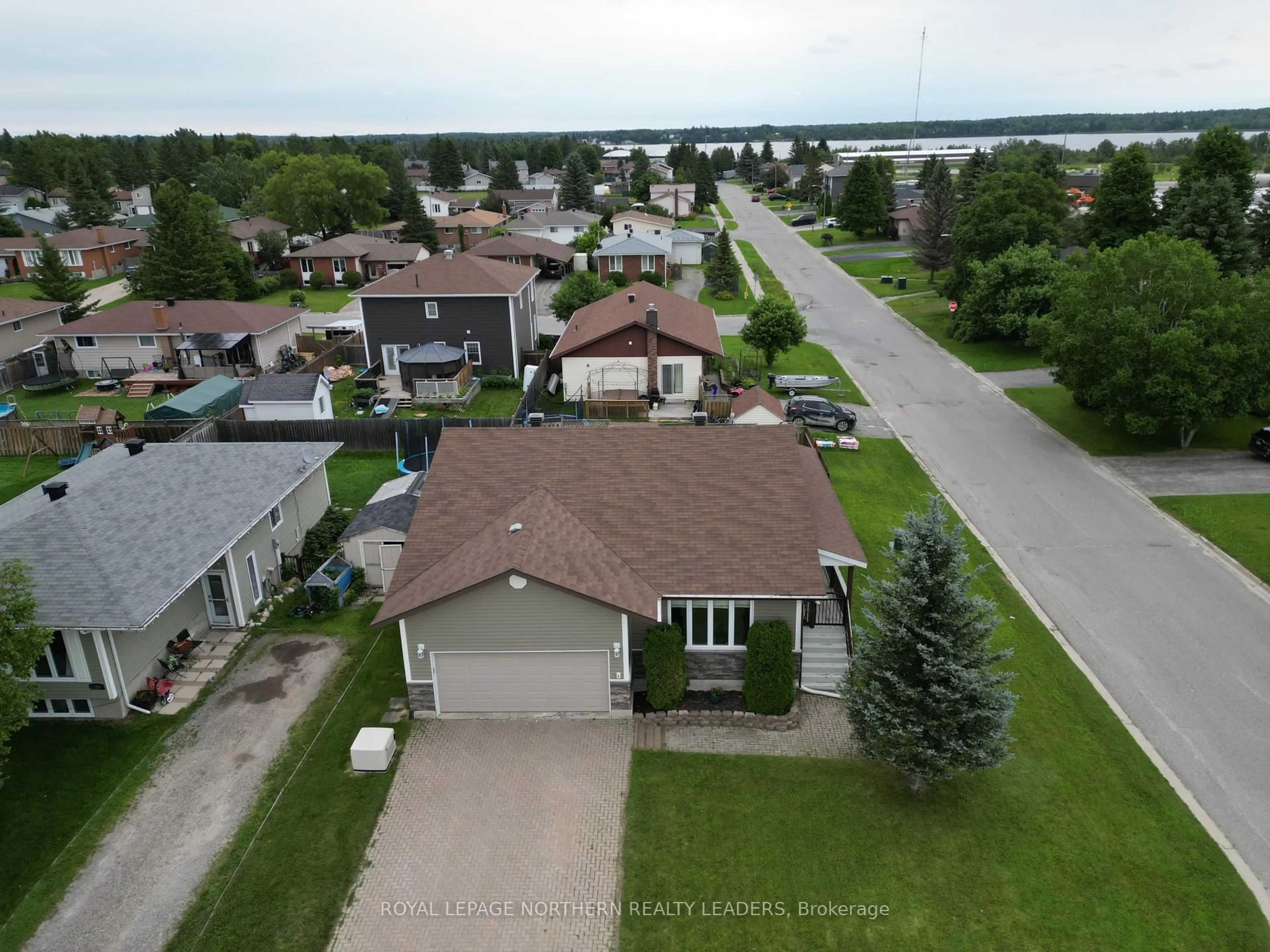 A pic from outside/outdoor area/front of a property/back of a property/a pic from drone, street for 1078 Michener Blvd, Timmins Ontario P0N 1K0