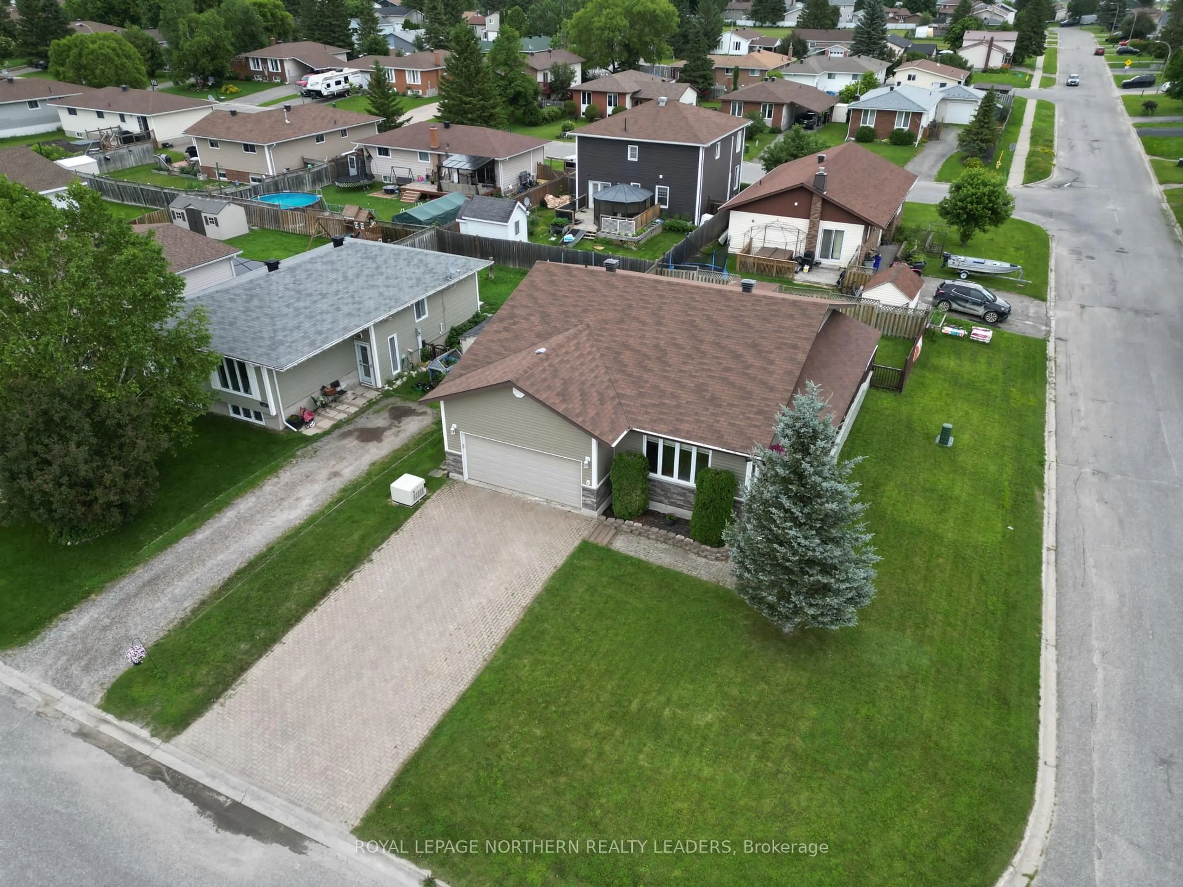 A pic from outside/outdoor area/front of a property/back of a property/a pic from drone, street for 1078 Michener Blvd, Timmins Ontario P0N 1K0