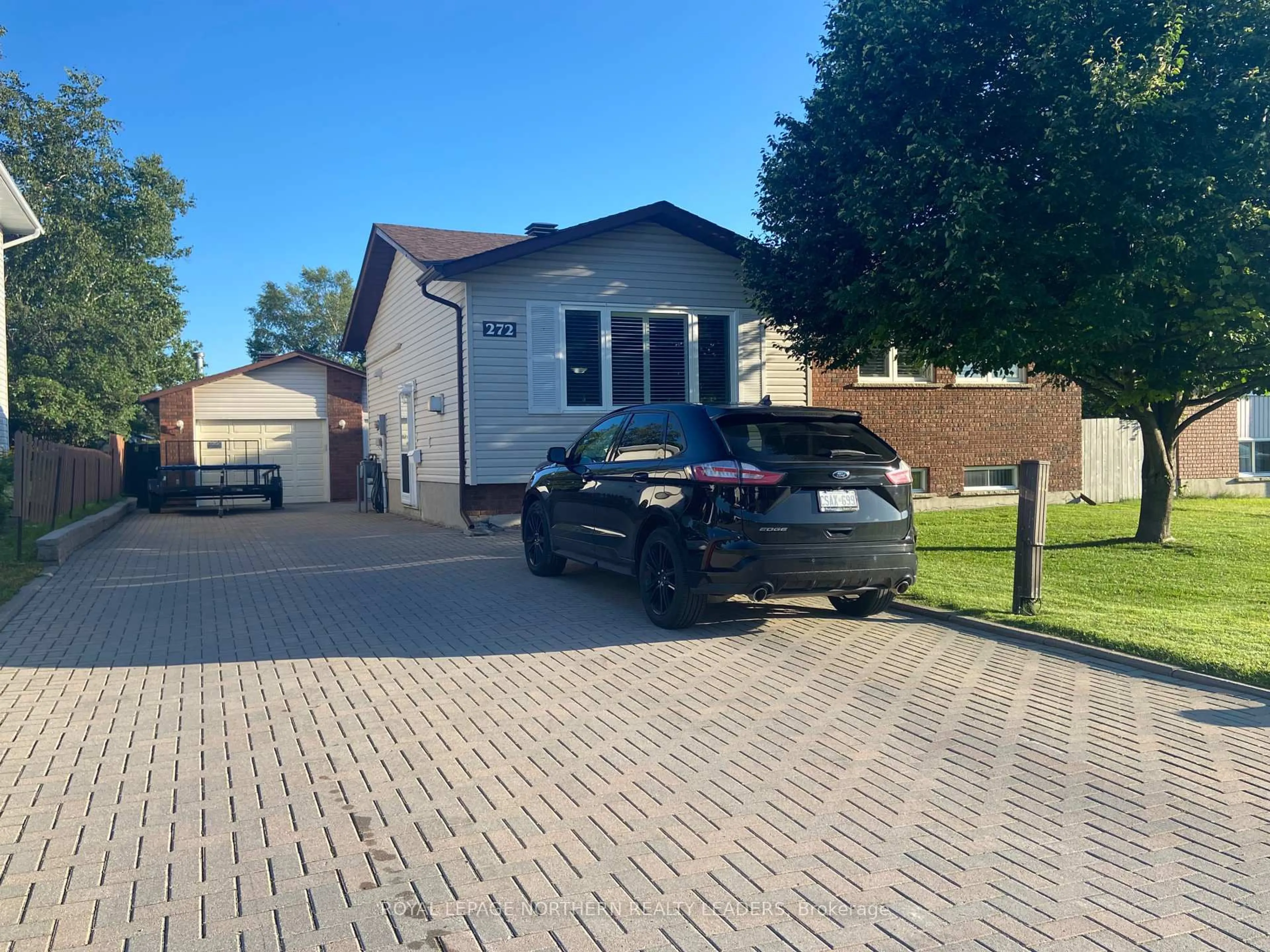 A pic from outside/outdoor area/front of a property/back of a property/a pic from drone, street for 272 Malette Cres, Timmins Ontario P4P 1C5