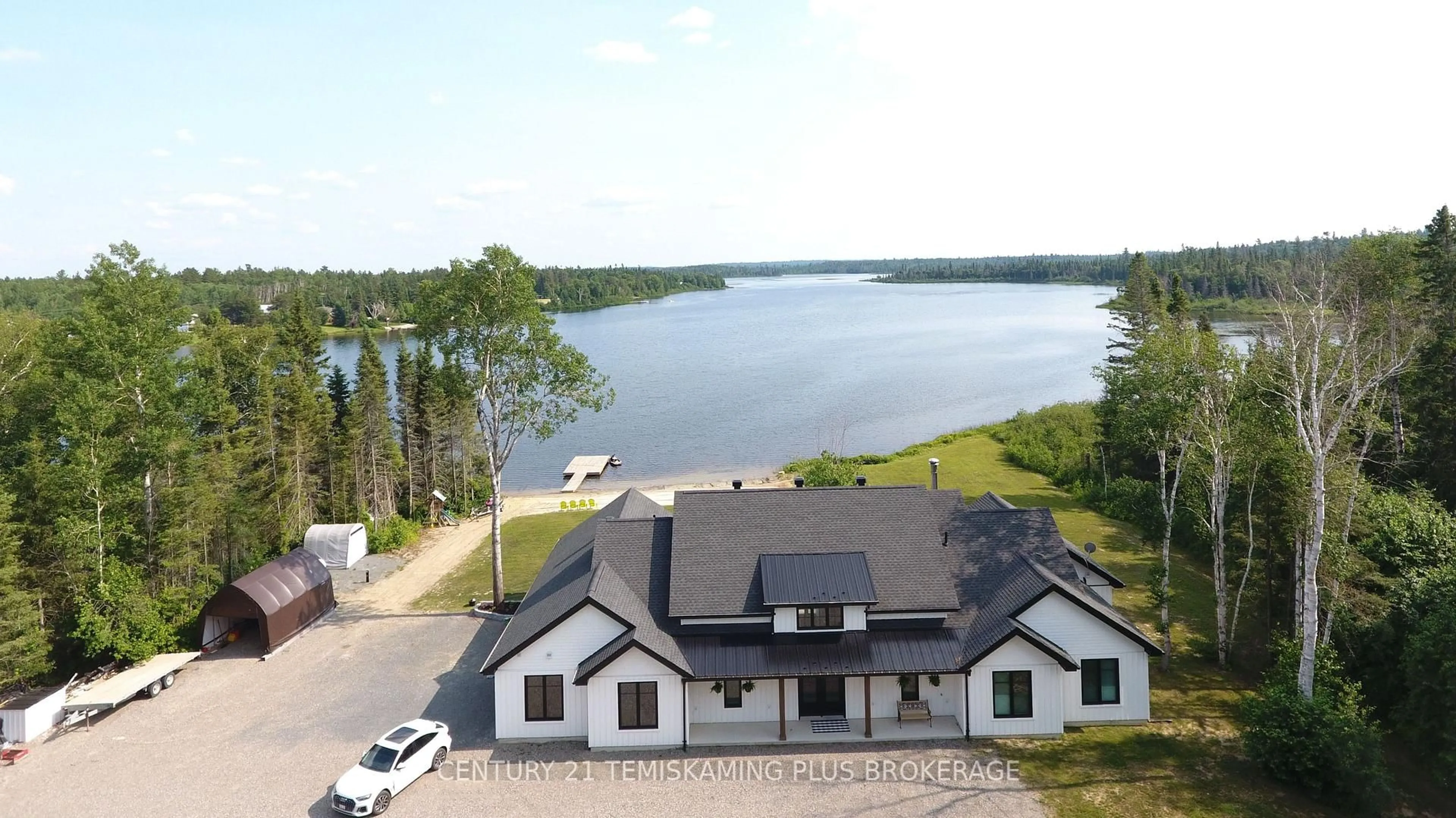 A pic from outside/outdoor area/front of a property/back of a property/a pic from drone, water/lake/river/ocean view for 8178 Pike Lake Rd, Hudson Ontario P0J 1P0