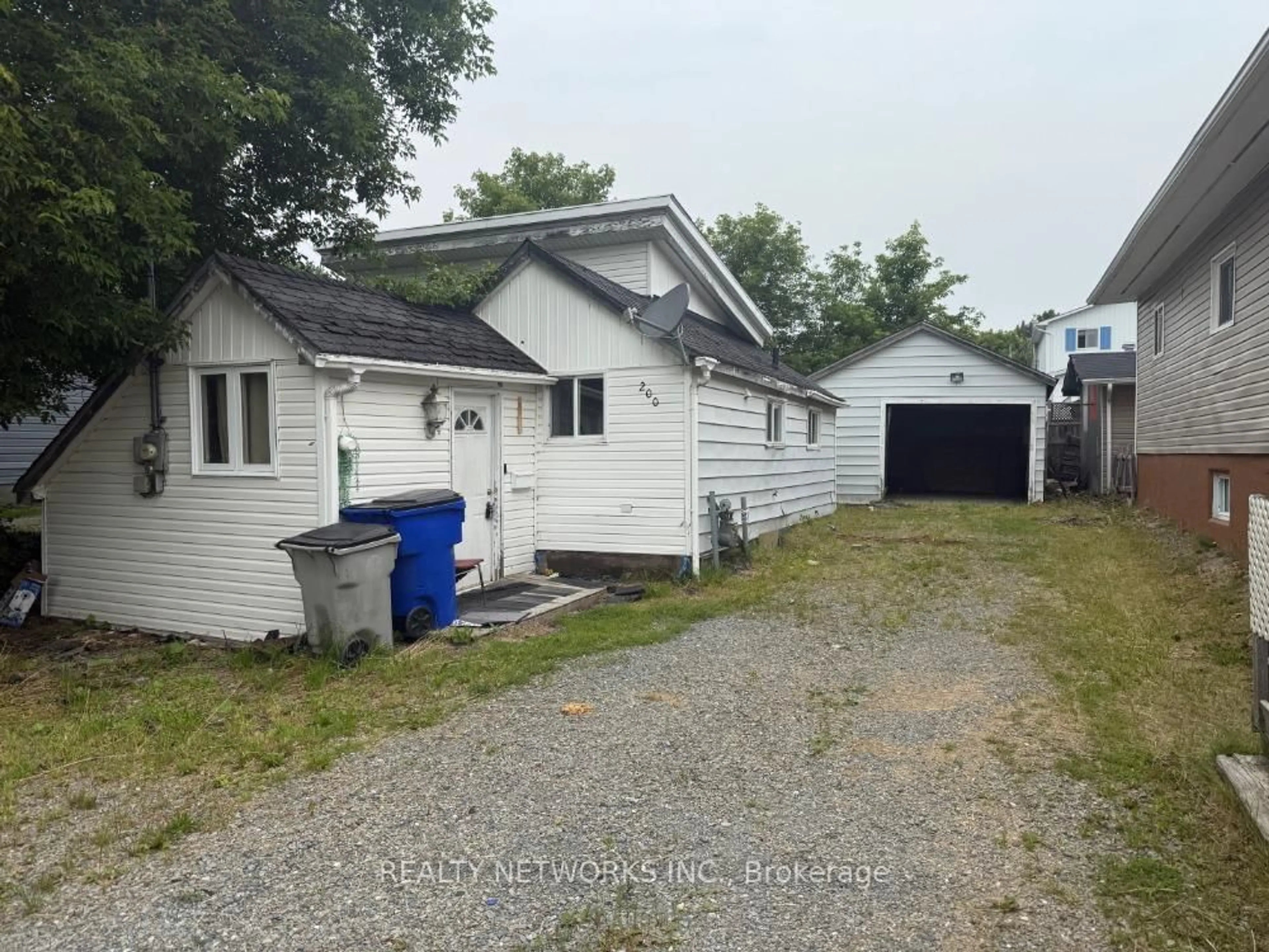 A pic from outside/outdoor area/front of a property/back of a property/a pic from drone, street for 200 Hillside Ave, Timmins Ontario P4N 4J6