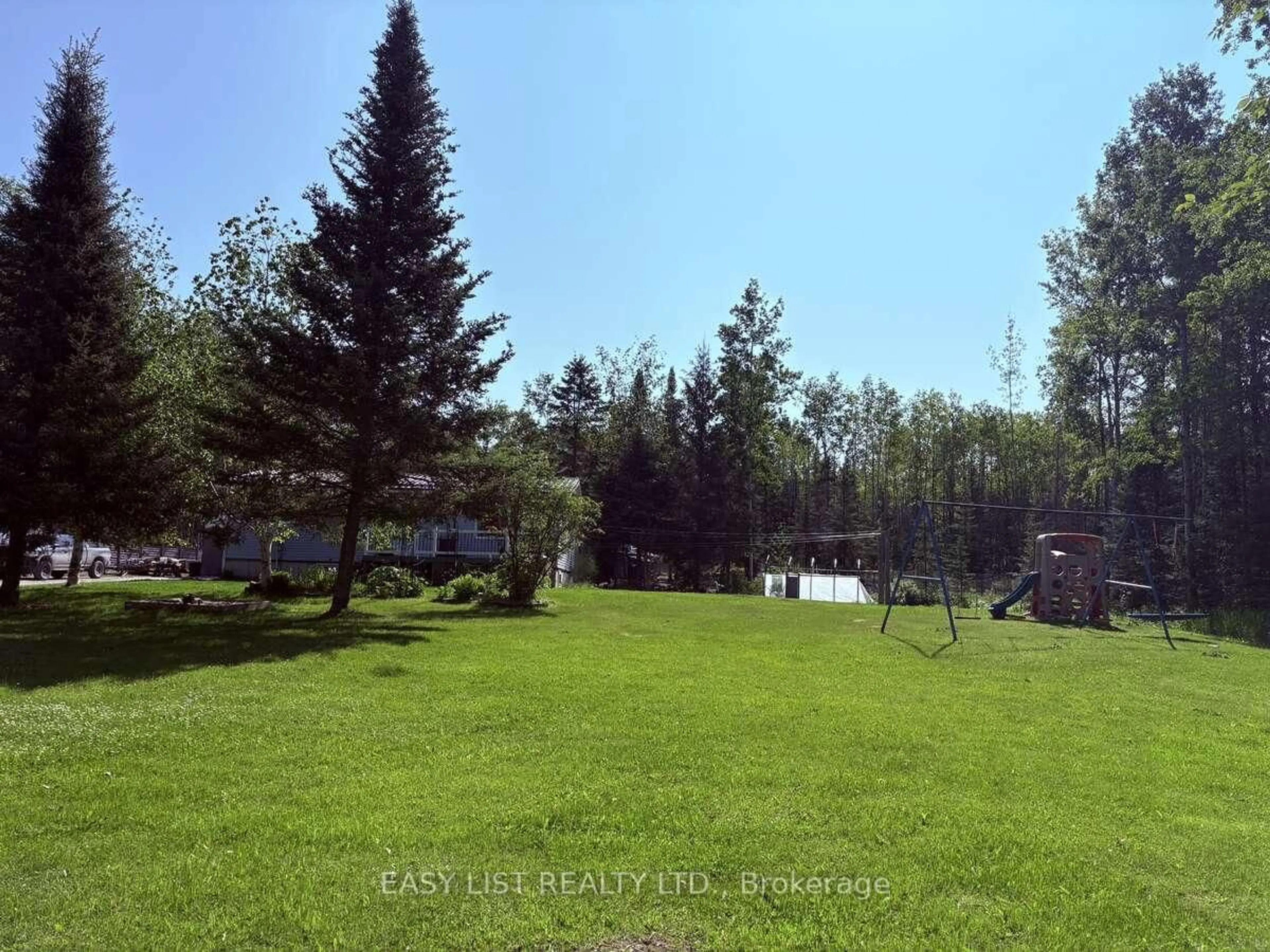 A pic from outside/outdoor area/front of a property/back of a property/a pic from drone, forest/trees view for 1058 Ruby Rd, Black River Matheson Ontario P0K 1N0