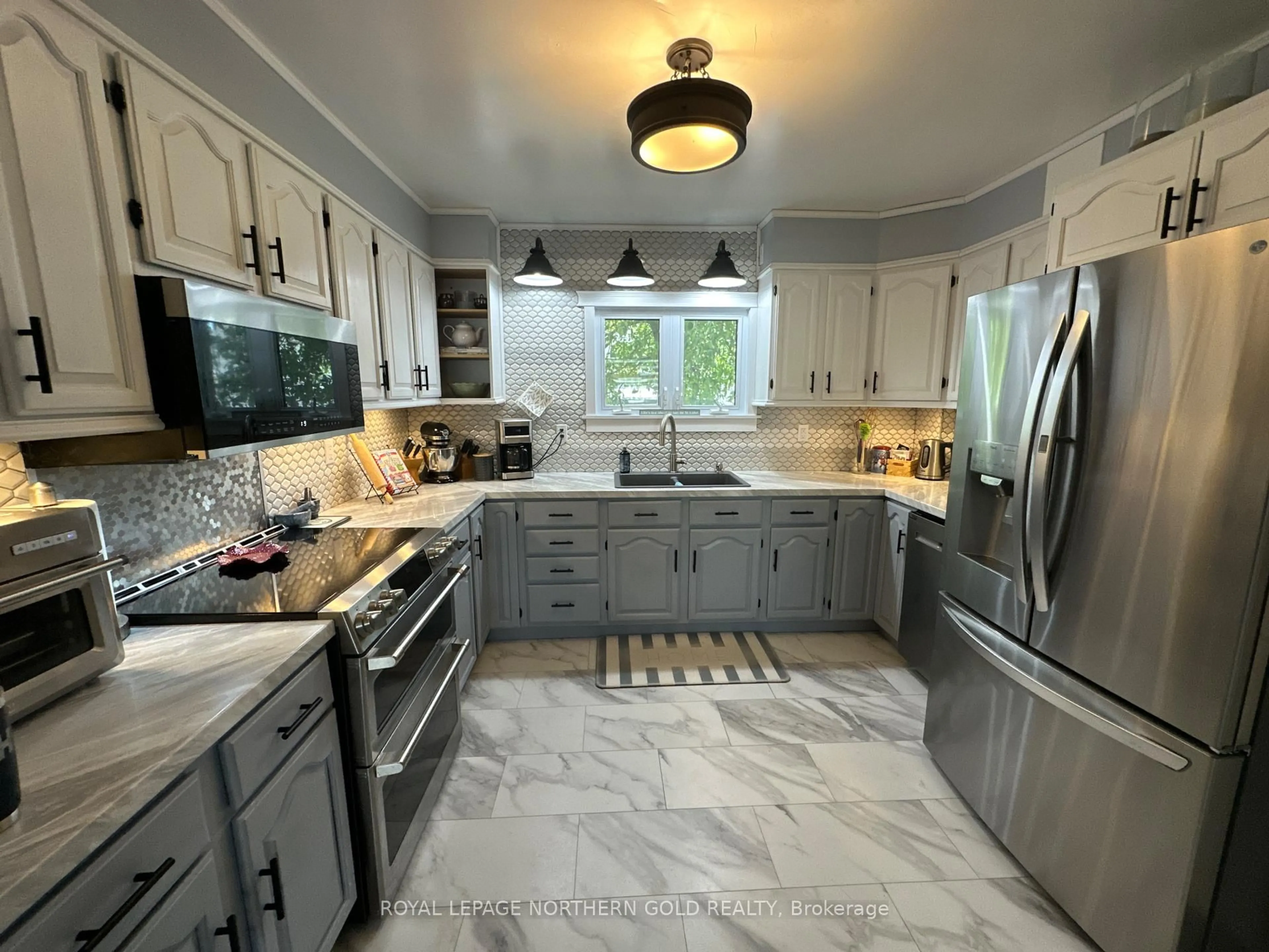 Open concept kitchen, ceramic/tile floor for 77 Second St, Kirkland Lake Ontario P2N 1R6