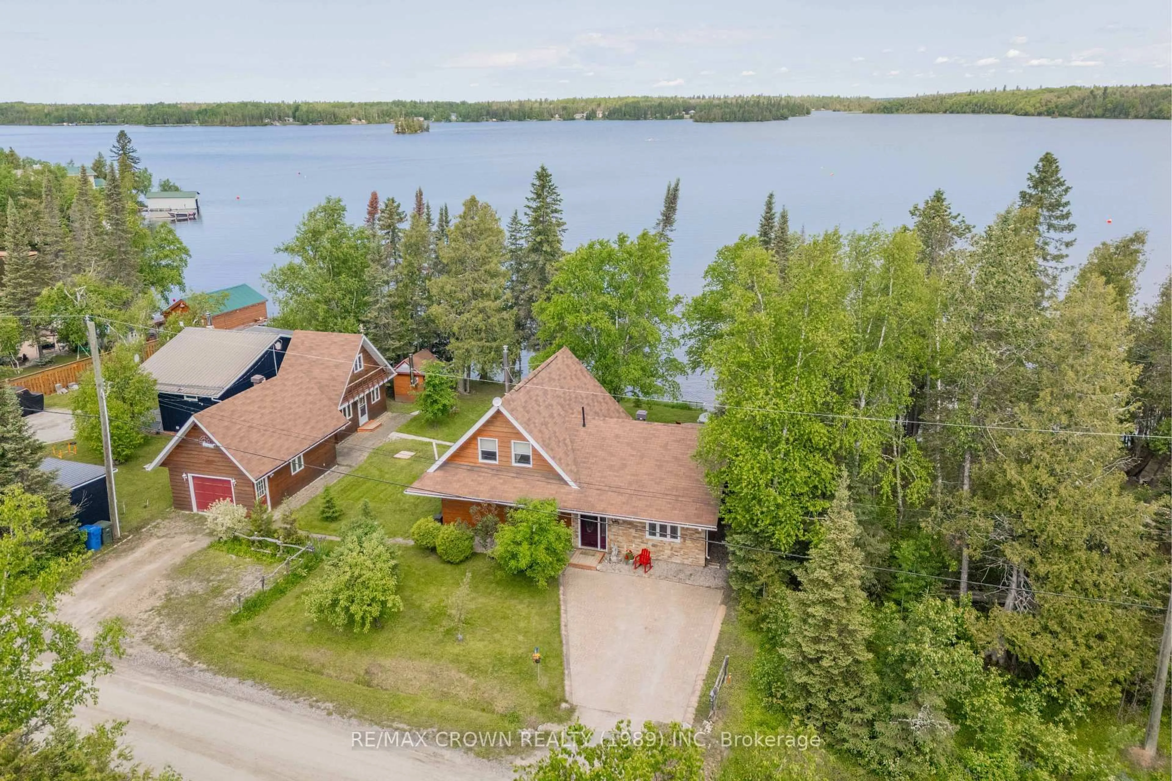 A pic from outside/outdoor area/front of a property/back of a property/a pic from drone, water/lake/river/ocean view for 99 Lefebvre Peninsula Rd, Moonbeam Ontario P0L 1V0