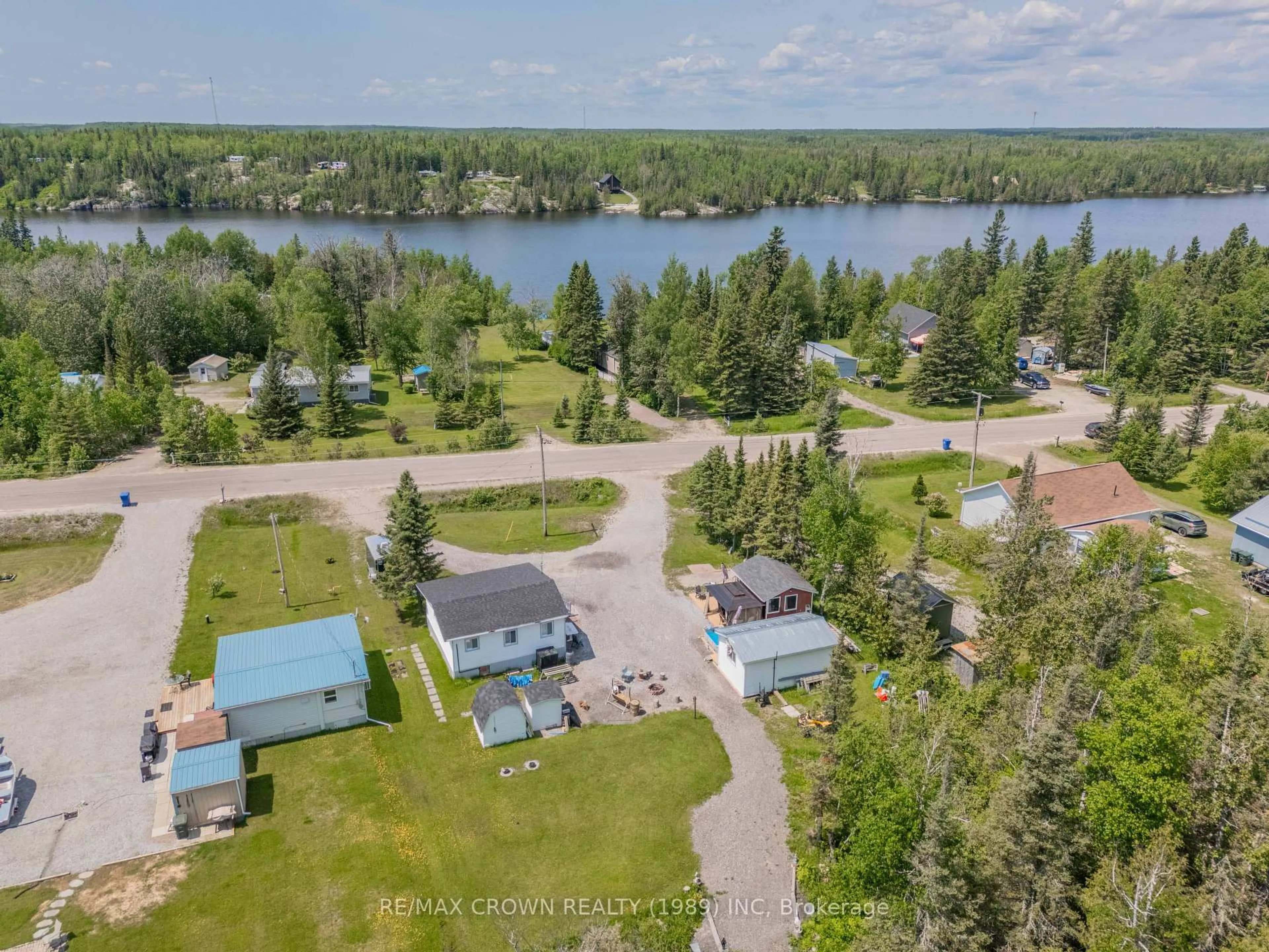 A pic from outside/outdoor area/front of a property/back of a property/a pic from drone, water/lake/river/ocean view for 56 Remi Lake Rd, Moonbeam Ontario P0L 1V0
